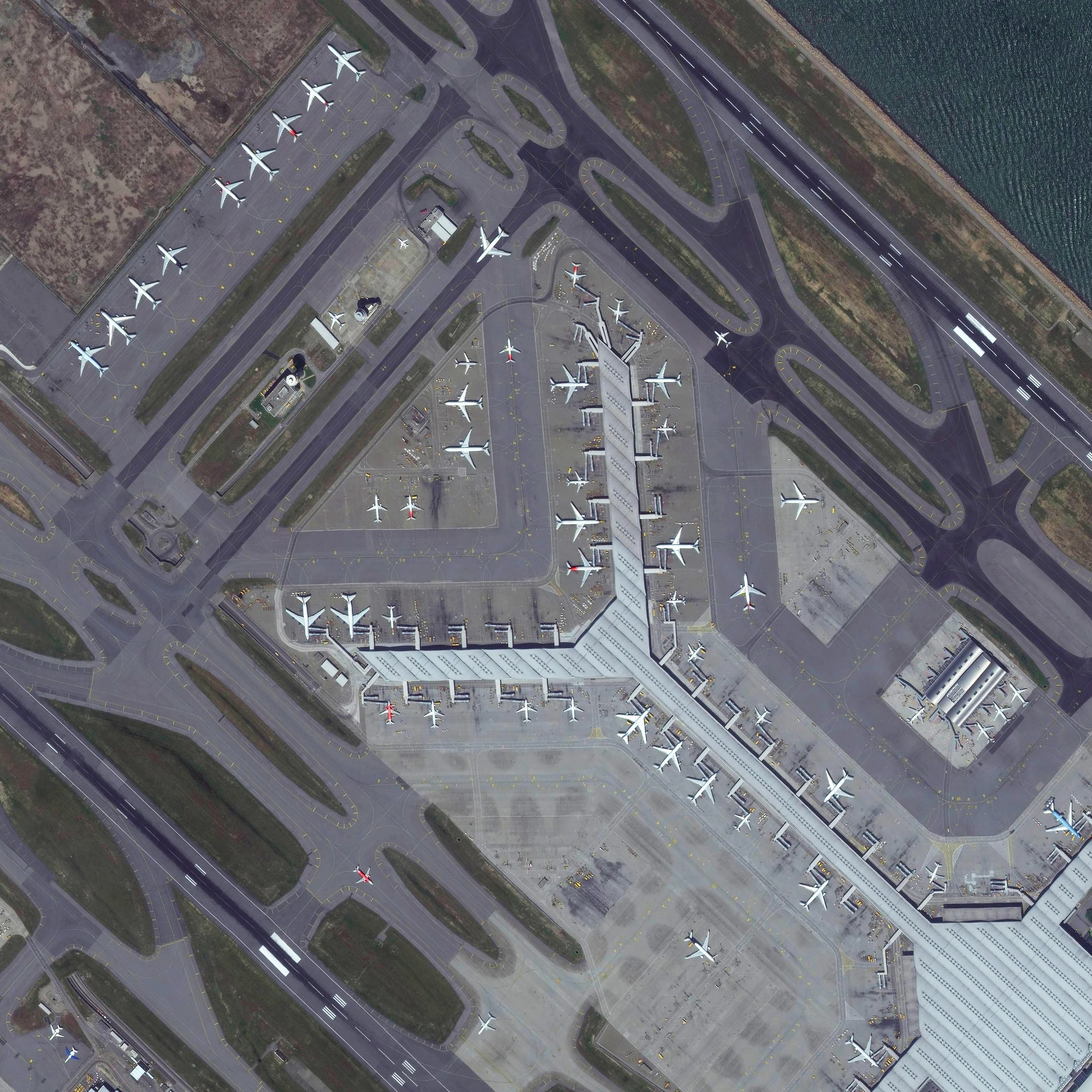 8/11/2015 Hong Kong International Airport Chek Lap Kok, Hong Kong 22°18′32″N 113°54′52″E Tonight I’m headed off on a trip to China, via Hong Kong International Airport. The facility handles more than 63 million passengers each year. Terminal 1, seen here, is the third largest airport passenger building in the world, measuring more than 6 million square feet. I’ll do my best to post during my travels but apologies in advance if internet connection is spotty!