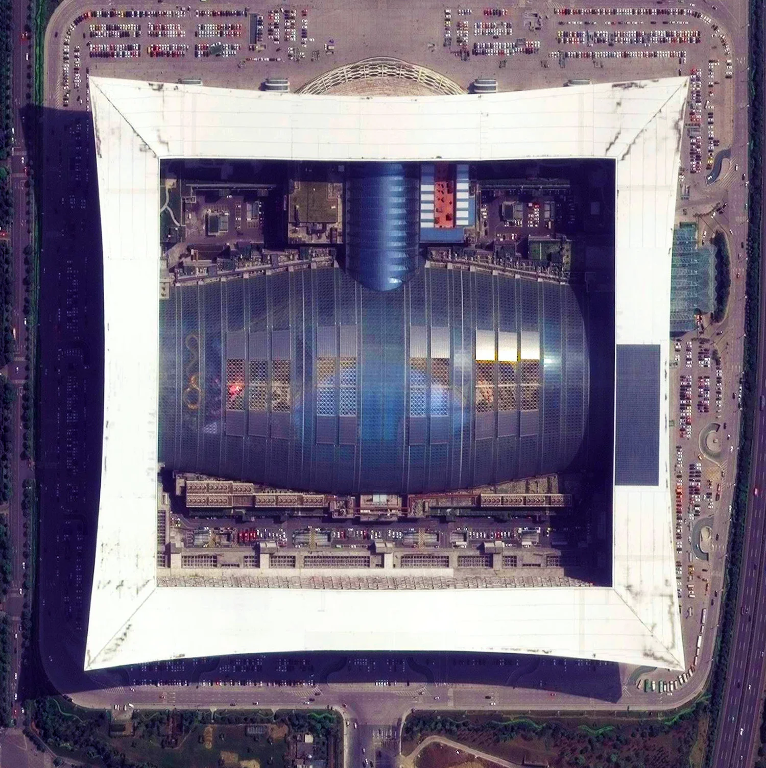 8/12/2015 New Century Global Center Chengdu, China 30° 34' 20" N, 104° 3' 39" E This morning I’ll fly to Chengdu, China. The city is home to the recently constructed New Century Global Center - a multipurpose facility that contains numerous shopping malls, an IMAX cinema, a “mediterranean village," a pirate ship, a skating rink, and a 500x130 foot screen that displays artificial sunrises and sunsets. The structure contains the largest amount of floor space for a single building with approximately 18 million square feet.