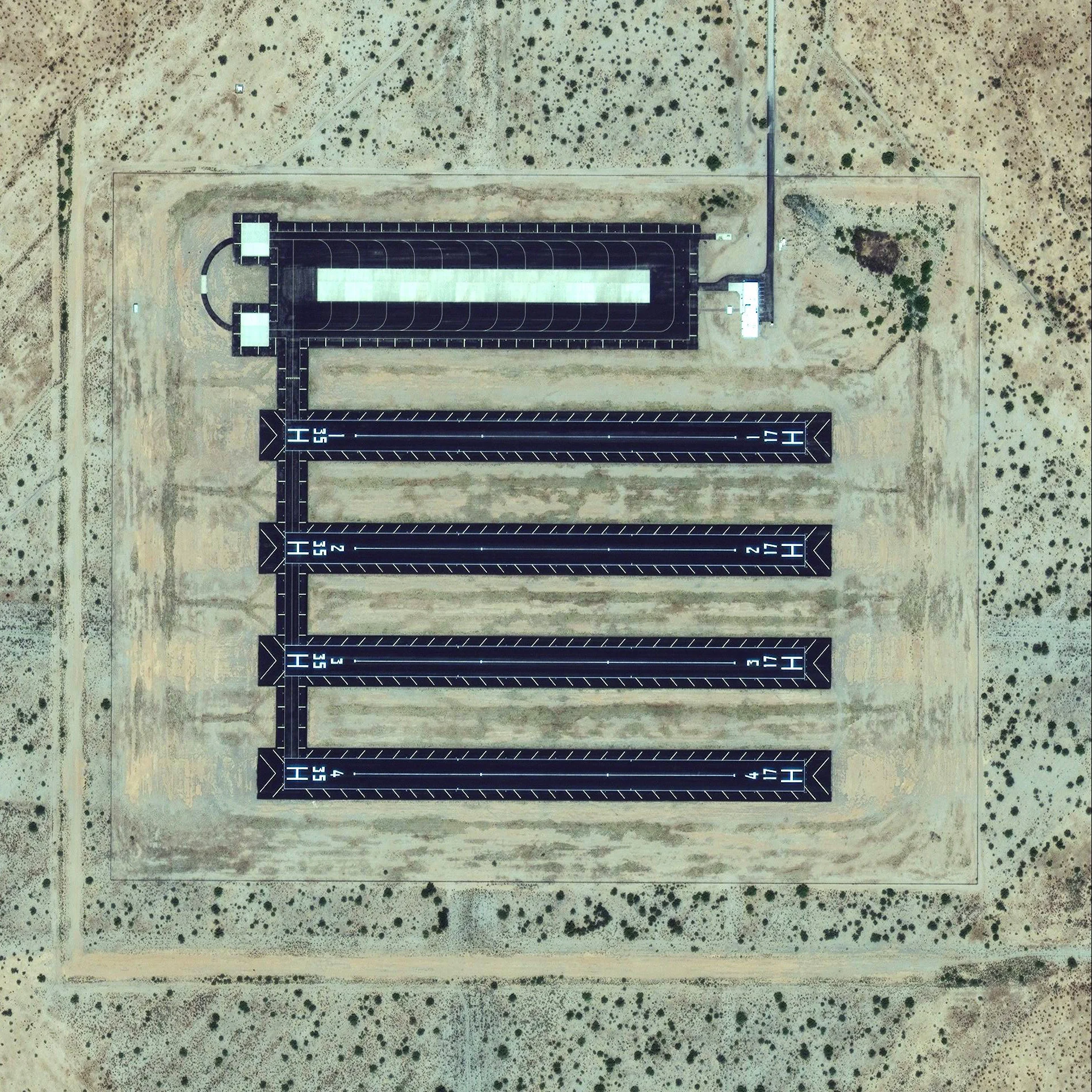 8/29/2015 Landing strips Eloy, Arizona, USA 32.663367, -111.487618 Multiple landing strips are visible in Eloy, Arizona, USA. Can anyone figure out what they are used for? It's a mystery to us too!