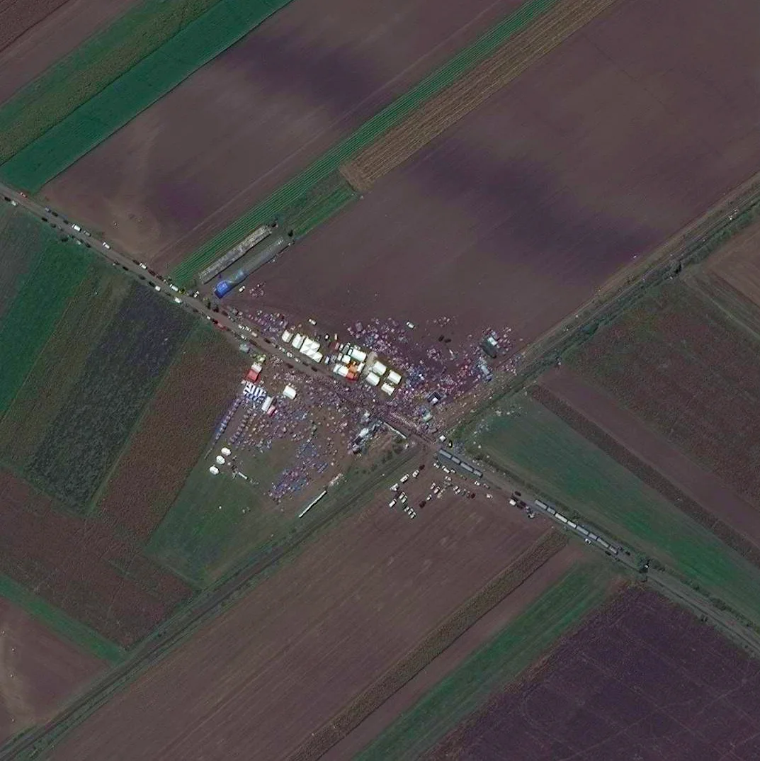 9/20/2015 European migrant crisis Röszke, Hungary 46.1817, 20.0109 As many of you know, Europe is currently being overwhelmed by a flood of migrants and refugees from the Middle East, many of whom are fleeing the devastation in Syria. Last week, the country of Hungary sealed its borders, forcing the travelers to go elsewhere. On September 13th, two days before the borders were closed, huge numbers of refugees came together in the Hungarian town of Röszke near the border with Serbia. This Overview shows that gathering as hundreds of migrants set up temporary shelter with tents and buses.