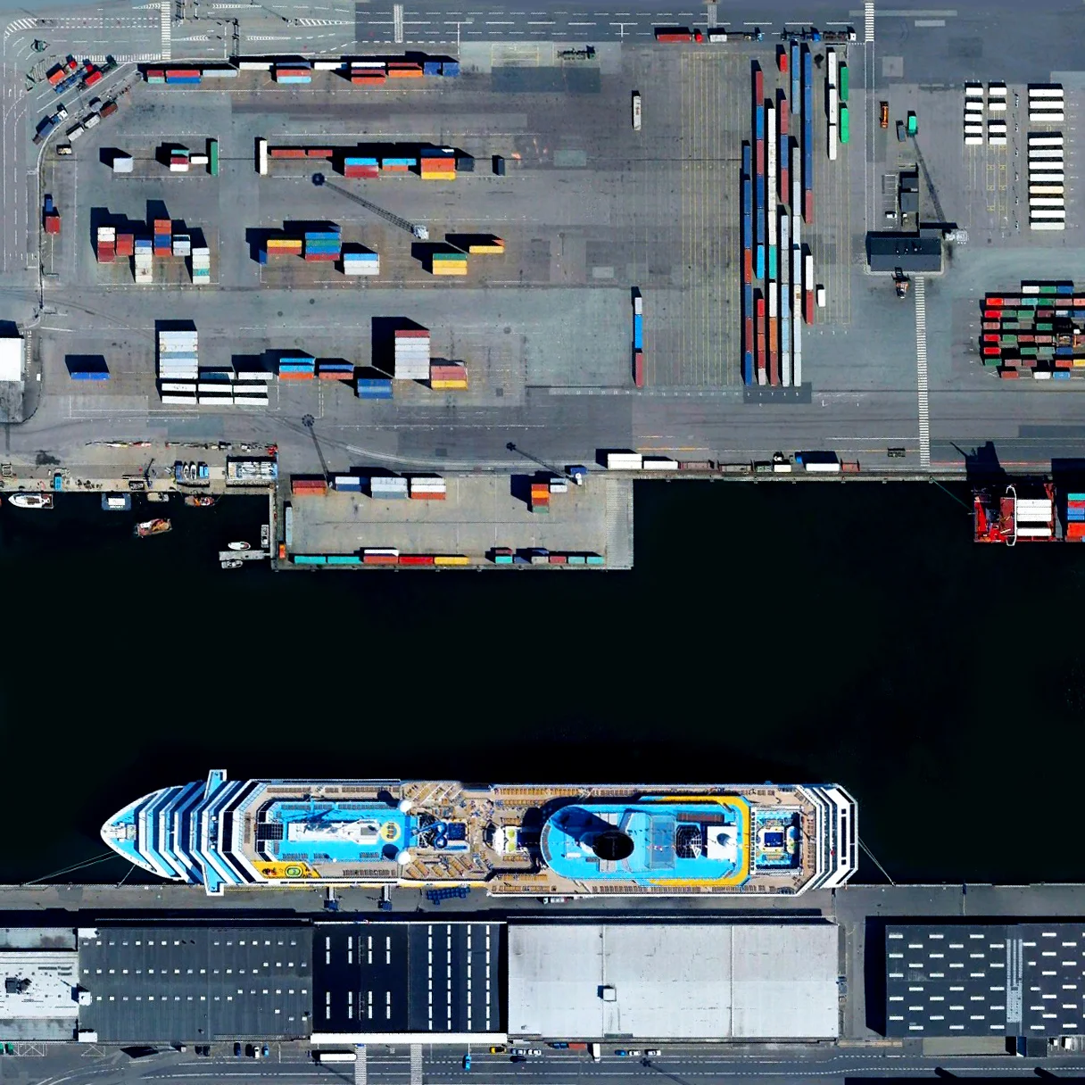 10/2/2015 Port of Copenhagen Copenhagen, Denmark 55.6718°N 12.5817°E The Port of Copenhagen in Copenhagen, Denmark has one of the largest passenger terminals in the Baltic Sea, handling more than 1.6 million passengers annually. A cruise ship with an approximate length of 1000 feet (305 meters) is seen at one of its docks. The facility also contains one of the region’s busiest cargo terminals, which moves more than 18 million tonnes of cargo each year.