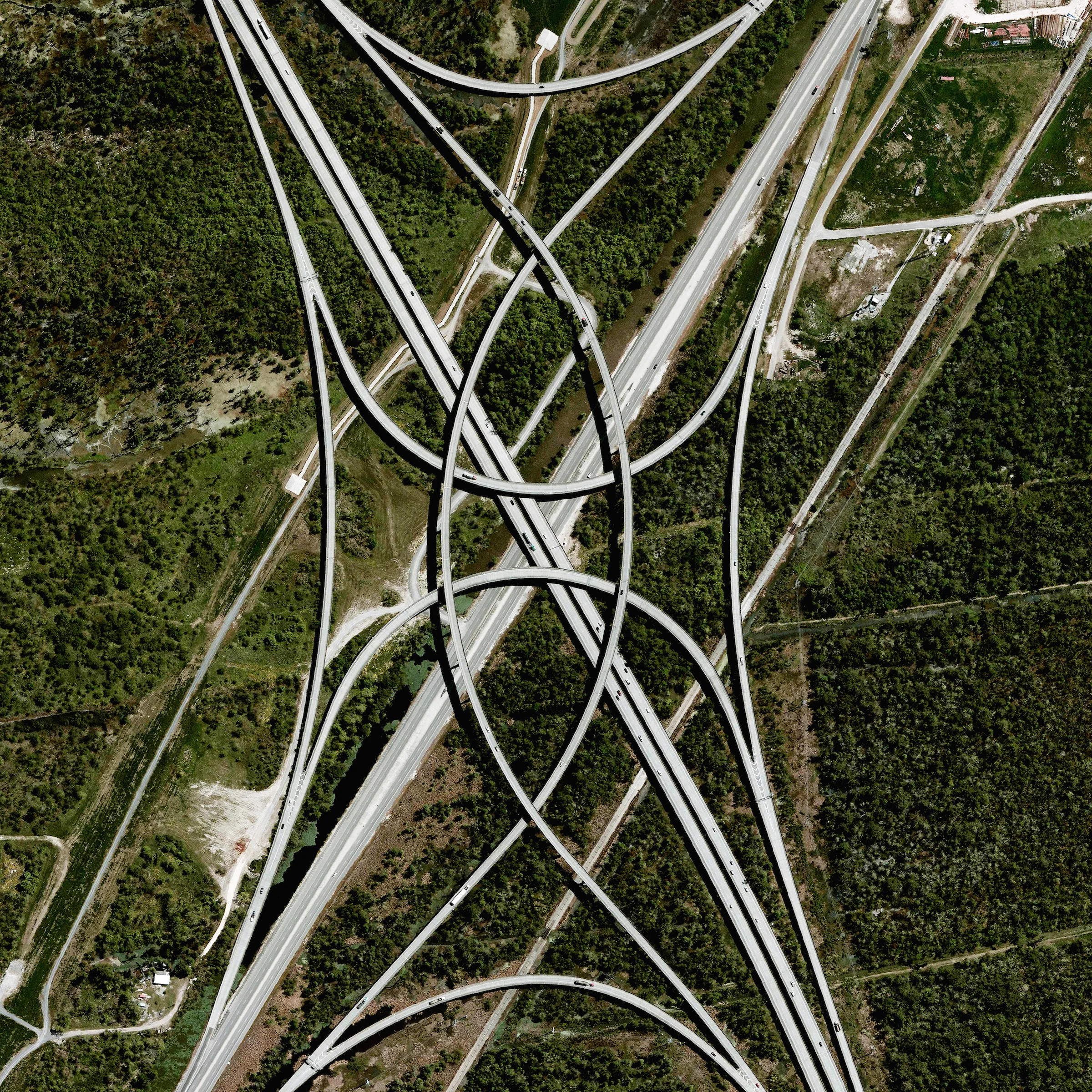 10/3/2015 Highway interchange New Orleans, Louisiana, USA 29.975279589°, -90.319193923° A highway interchange connects Interstate 310 and U.S Route 61 outside of New Orleans, Louisiana, USA. Because the roadways in this area were built on top of environmentally sensitive wetlands, construction platforms were mounted on top of concrete piles to minimize disruption with the terrain below.