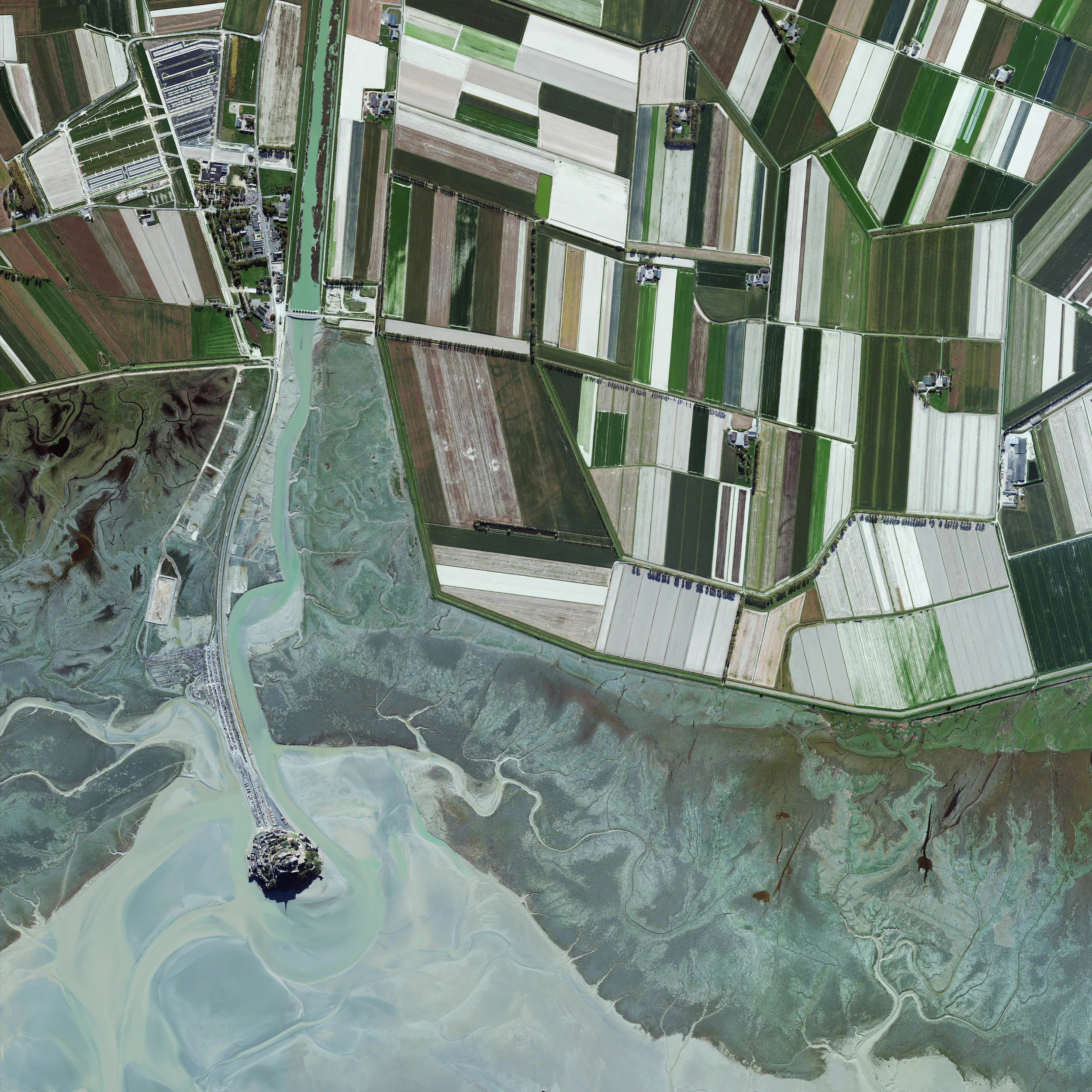 10/17/2015 Mont Saint-Michel Normandy, France 48°38′10″N 1°30′41″W Mont Saint-Michel is a commune located one kilometer off the coast of Normandy, France. Over the past 600 years, the island has functioned as a prominent monastery (accessible to pilgrims only during low tide), a French fortification that withstood England attacks during the Hundred Years’ War, and a prison. Today, Saint-Michel is one of the most popular tourist attractions in the country.