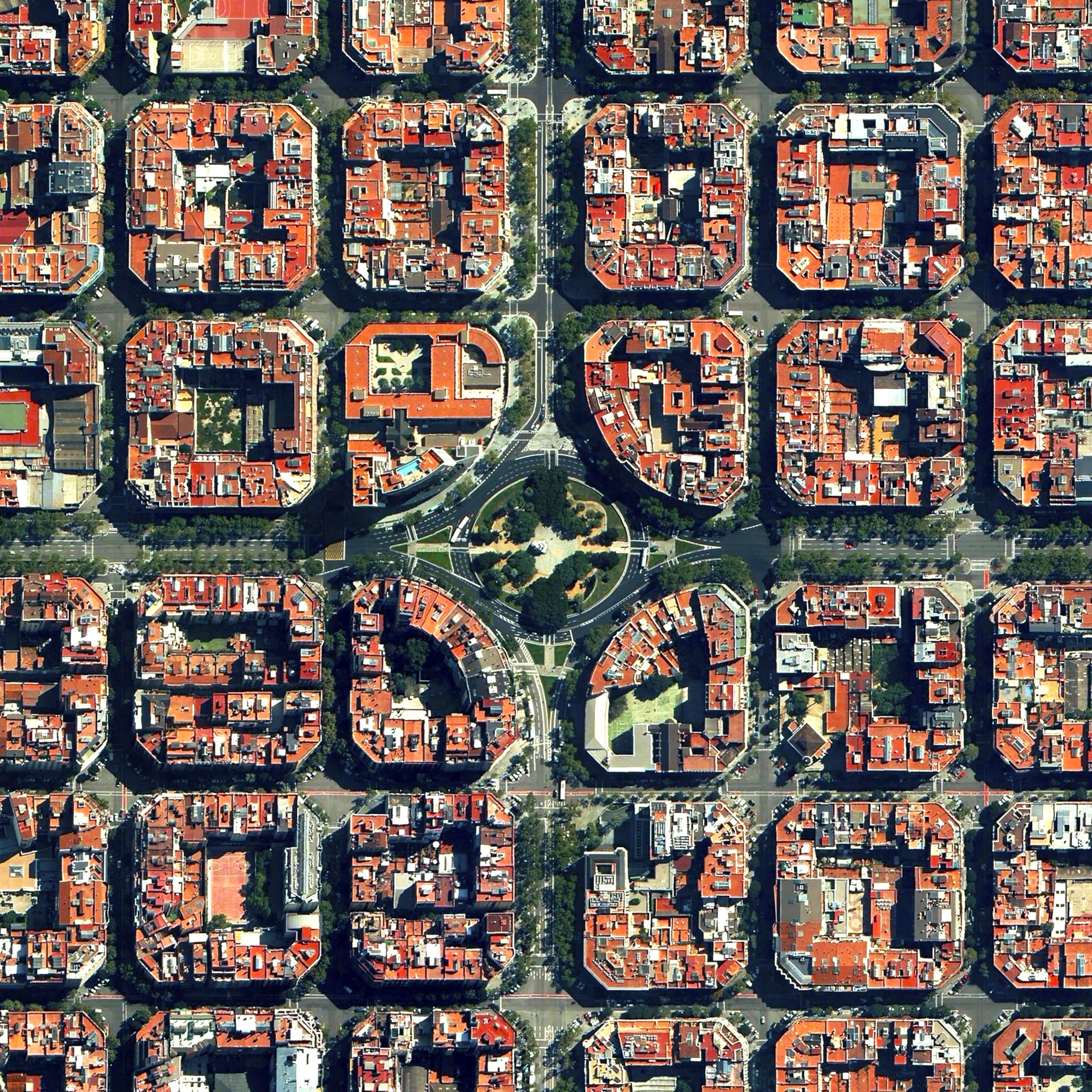 10/28/2015 Eixample Barcelona, Spain 41°23′27″N 2°09′47″E The Eixample District in Barcelona, Spain is characterized by its strict grid pattern and apartments with communal courtyards. This thoughtful and visionary design was the work of Ildefons Cerdà. His plan features broad streets that widen at octagonal intersections to create greater visibility with increased sunlight, better ventilation, and more space for short-term parking.