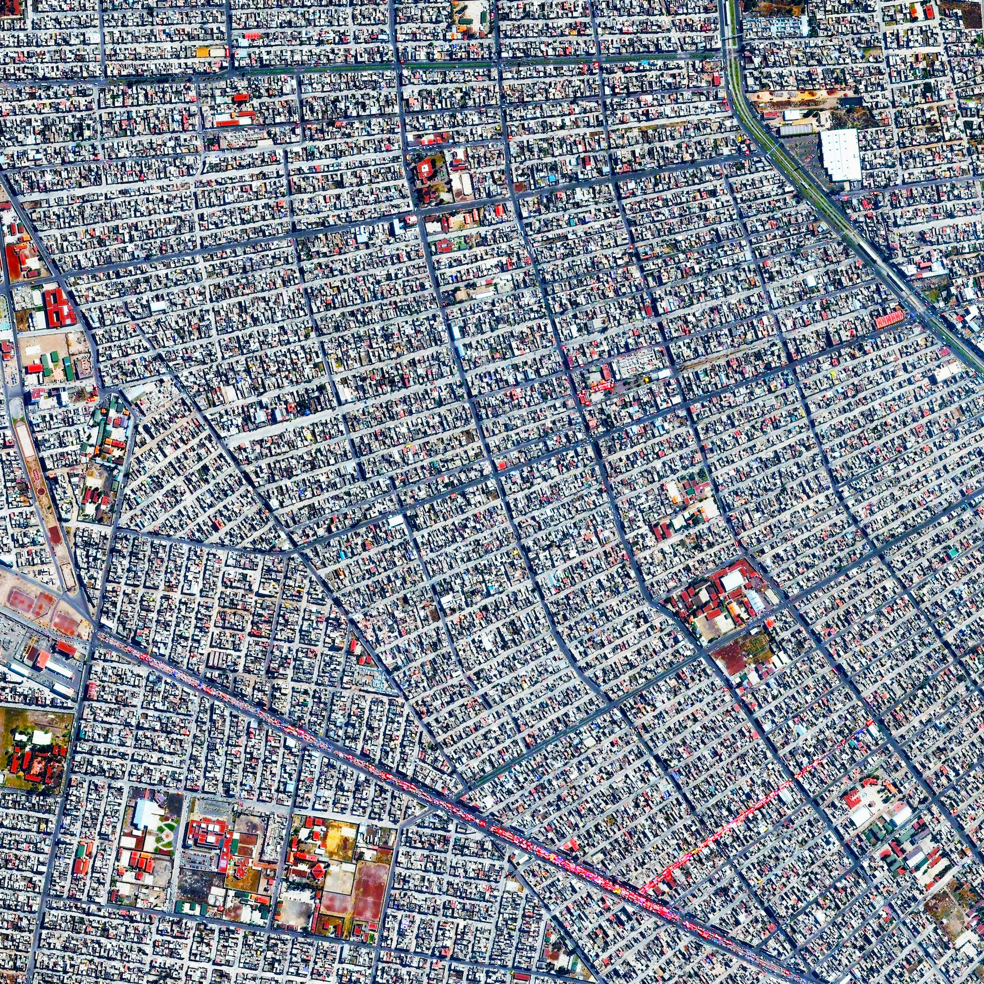 11/4/2015 Chimalhuacán Chimalhuacán, Mexico 19.435062776°, -98.968516816° Chimalhuacán is a city with more than 600,000 residents in the eastern part of the State of Mexico, Mexico. The colorful strip seen across the bottom of this Overview is a open-air market known as a tianguis. Here, merchants cover their stalls with vibrant canopies to protect themselves from harsh sun and inclement weather.