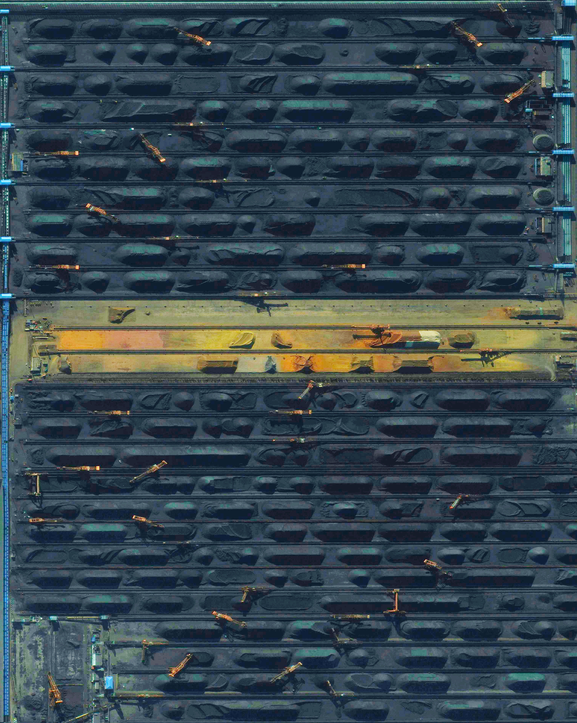 11/5/2015 Qinhuangdao Coal Terminal Qinhuangdao, China 39.933622168°, 119.683840353° On Tuesday, new data from the Chinese government revealed that the country has been burning up to 17% more coal each year than previously disclosed. While president Xi Jinping recently promised to halt the growth of his country's carbon dioxide emissions by 2030, the new figures mean that China has been burning an additional 600 million tons of coal each year. The sharp upward revision in official figures means that China has released much more carbon dioxide — almost a billion more tons a year — than previously estimated. This Overview shows the coal terminal at the Port of Qinhuangdao - the largest coal shipping facility in China. From here, approximately 210 million metric tons of coal are primarily transported to coal-burning power plants in the major cities in southern China each year. This figure is believed to account for approximately half of the country’s annual consumption.