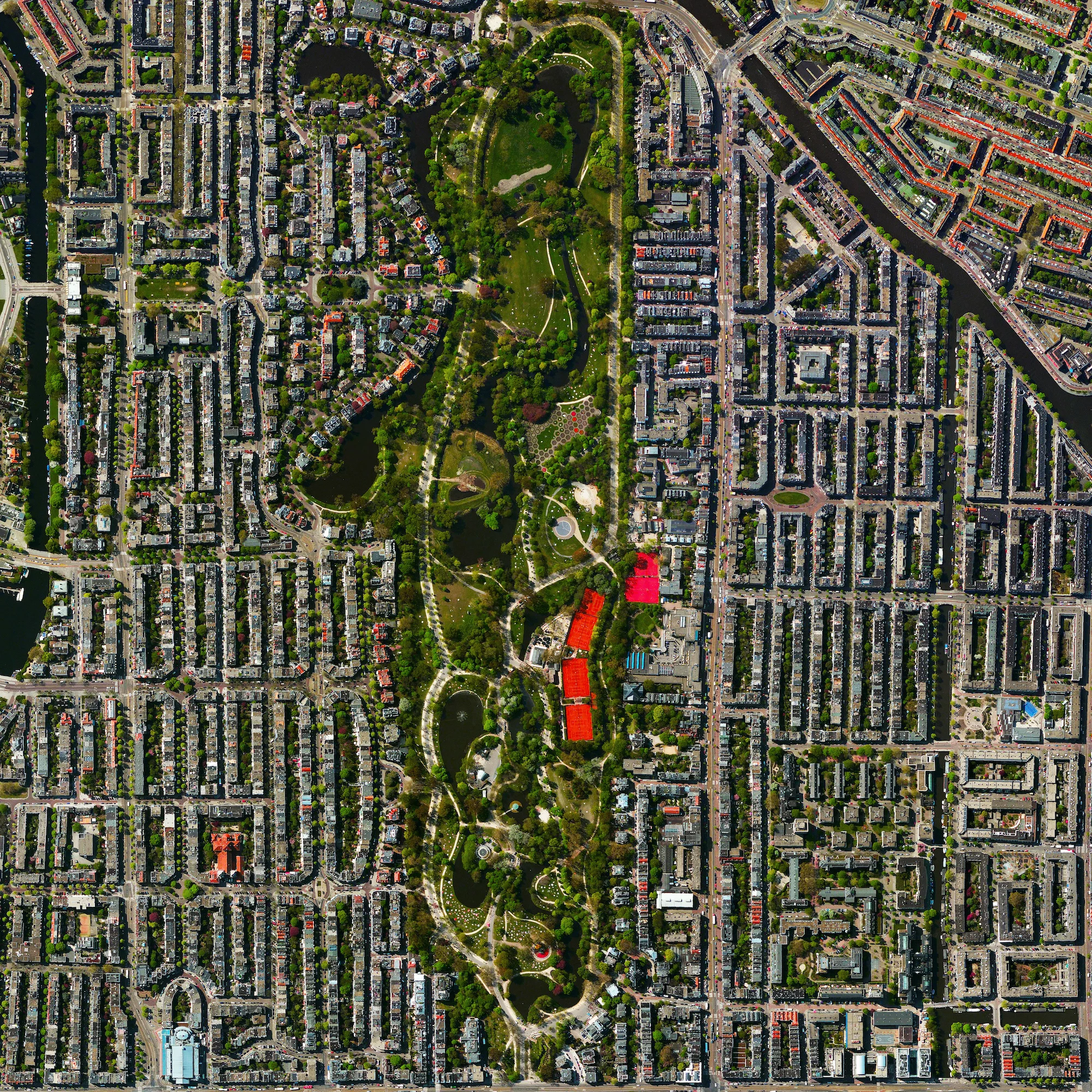 12/2/2015 Vondelpark Amsterdam, Netherlands 52.358°N 4.868°E The Vondelpark is a public urban park in Amsterdam, Netherlands that attracts more than 10 million visitors each year. The park opened in 1865 and is named after the 17th-century author Joost van den Vondel. In addition to its ample green spaces and ponds, the Vondelpark contains an open-air theatre, sculptures, athletic facilities, and numerous playgrounds.