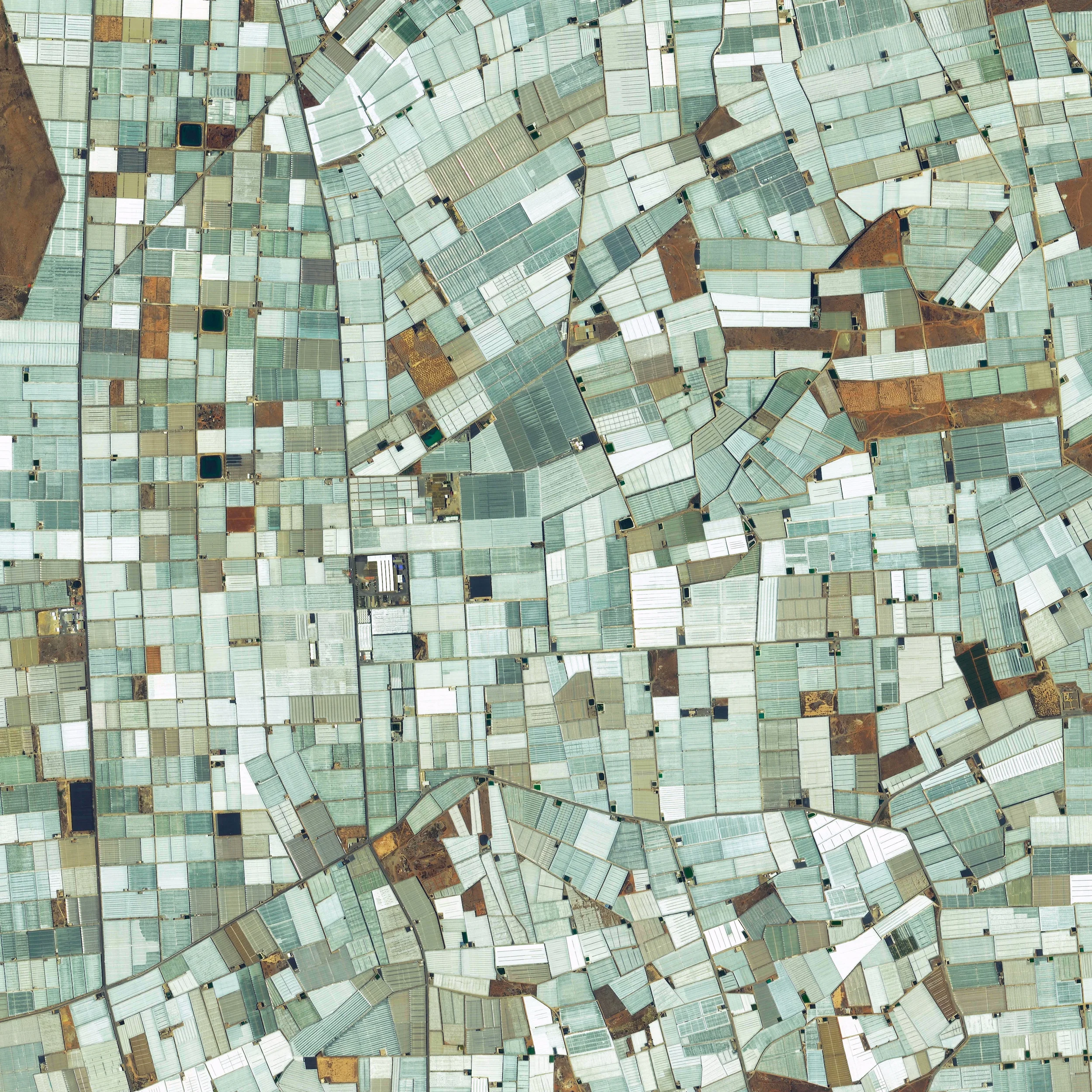 12/29/2015 Plasticulture Almeria, Spain 36.715441373°, -2.721484966° Here’s another favorite Overview from 2015. Greenhouses - also known as plasticulture - cover approximately 20,000 hectares of land (more than 75 square miles) in Almeria, Spain. The use of plastic covering is designed to increase produce yield, increase produce size, and shorten growth time. For a sense of scale, this Overview shows roughly eight square miles.