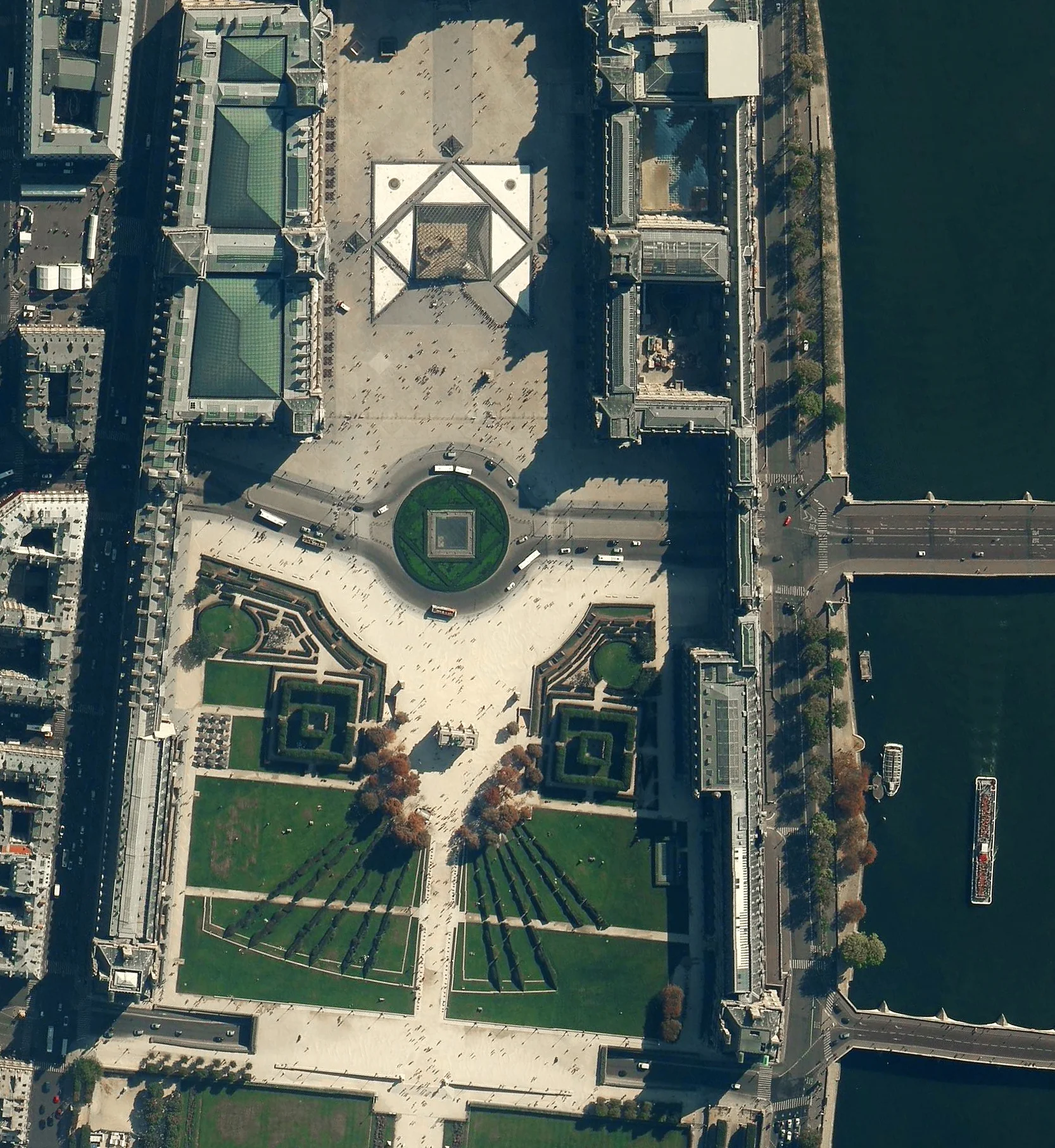 2/2/2016 Louvre Museum Paris, France 48.860854°N 2.335812°E A river cruise passes by the Louvre Museum in Paris, France. Located on the Seine River, the Louvre is the world’s most visited museum, receiving more than nine million visitors per year. The entrance to the museum, seen at the top and center of this Overview is a glass and metal pyramid, designed by architect I.M. Pei. Visitors enter through the pyramid, descend into the spacious lobby, and then re-ascend into the wings of the museum.