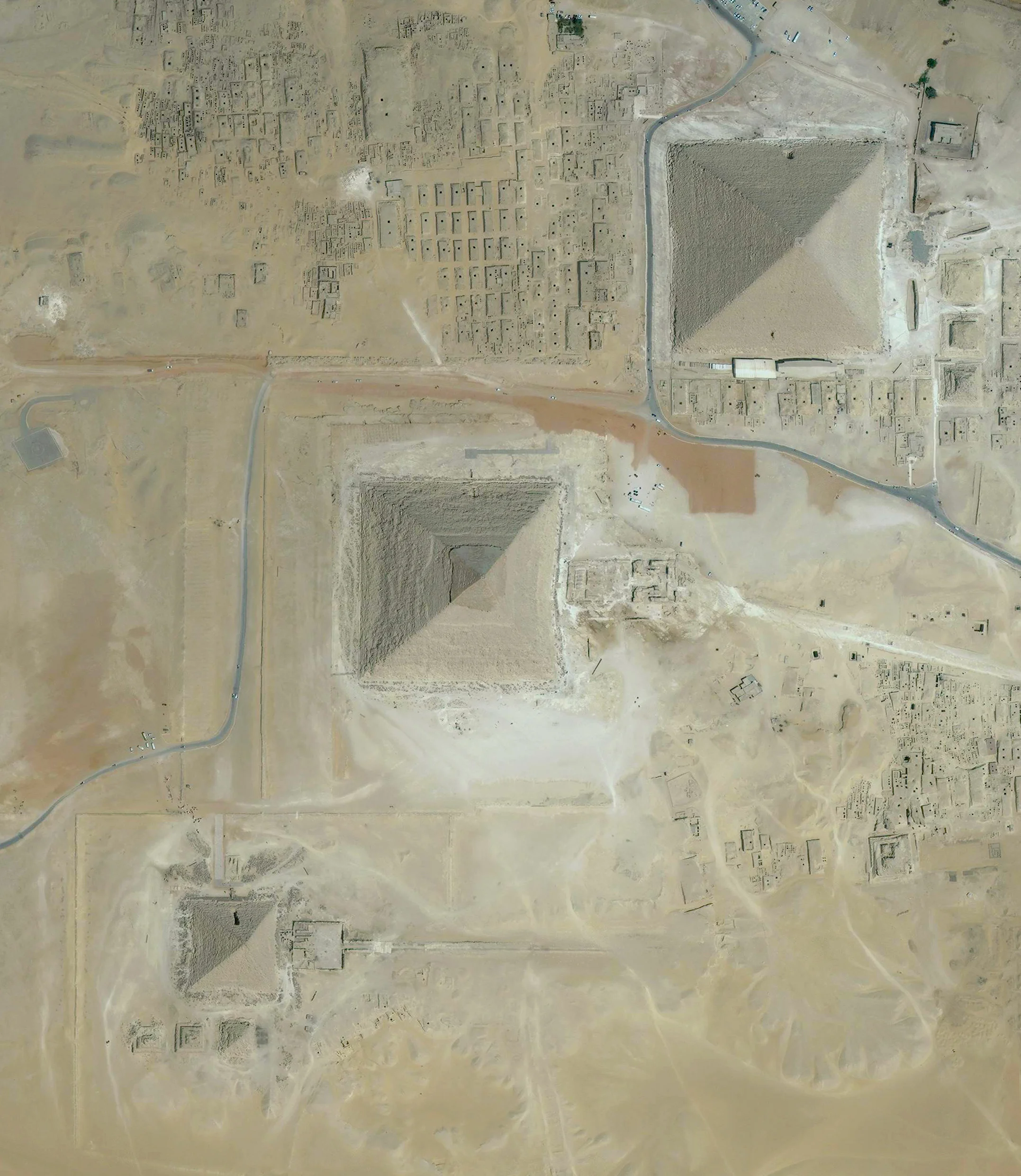 2/28/2016 Pyramids of Giza Giza, Egypt 29°58′34″N 31°7′58″E The Great Pyramids of Giza are located on the outskirts of Cairo, Egypt. Dating back to 2580 BC, the Great Pyramid, the largest structure at the site, is the oldest of the Seven Wonders of the Ancient world and the only one to remain largely intact. With an estimated 2,300,000 stone blocks weighing from 2 to 30 tons each, the 481 foot pyramid was the tallest structure in the world for more than 3,800 years.