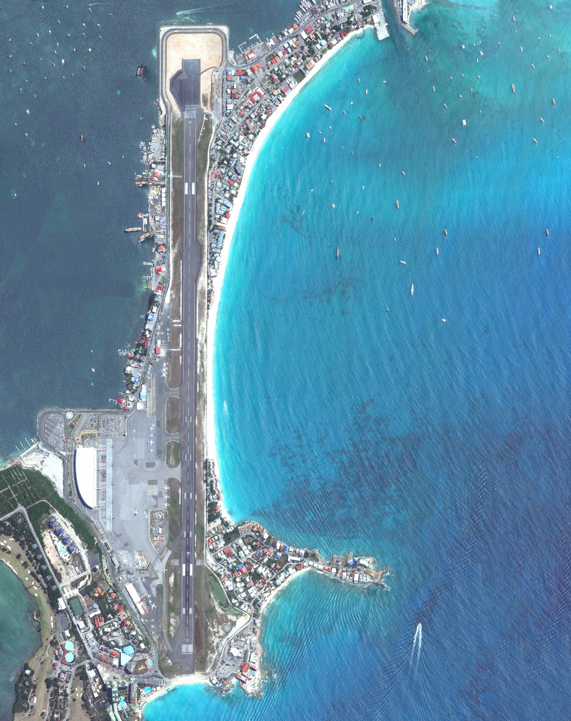 3/17/2016 Princess Juliana International Airport Saint Martin 18.040823°, -63.109948° Princess Juliana International Airport is the main airport on the Caribbean island of Saint Martin. The airport is well-known for the approach to Runway 10, seen at the bottom of this Overview. Here arriving aircraft must have a 3° glide slope, flying at a shockingly low altitude over people relaxing on Maho Beach, to land safely.