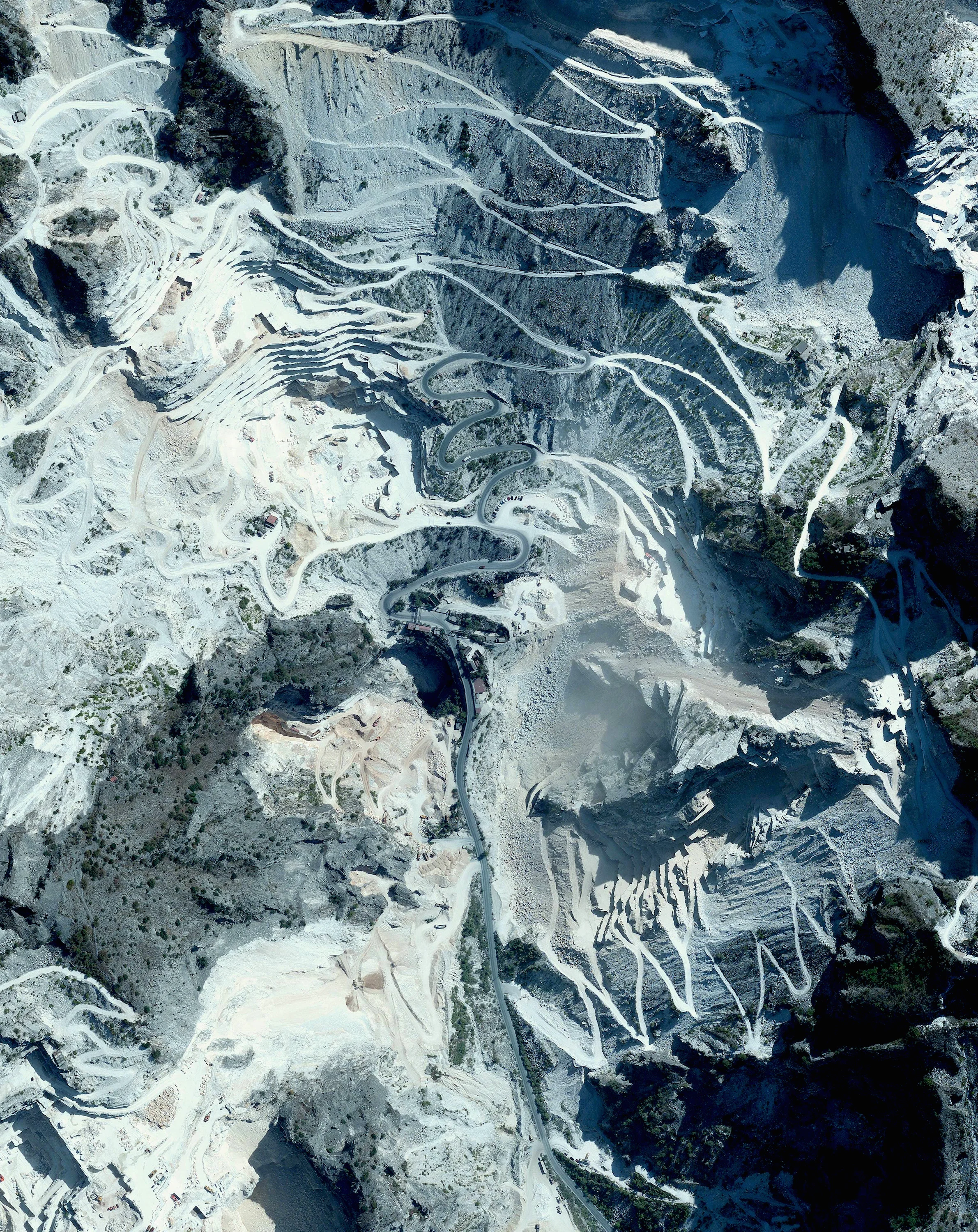 3/18/2016 Carrara marble Carrara, Italy 44.1009886, 10.131797 Marble quarriers are visible in Carrara, Italy. The blue-grey marble that is extracted here is widely used in sculpture like Michelangelo’s David and in building decor like The Pantheon. With more than 650 active or abandoned quarry sites, more marble has been extracted here than any other place on earth.