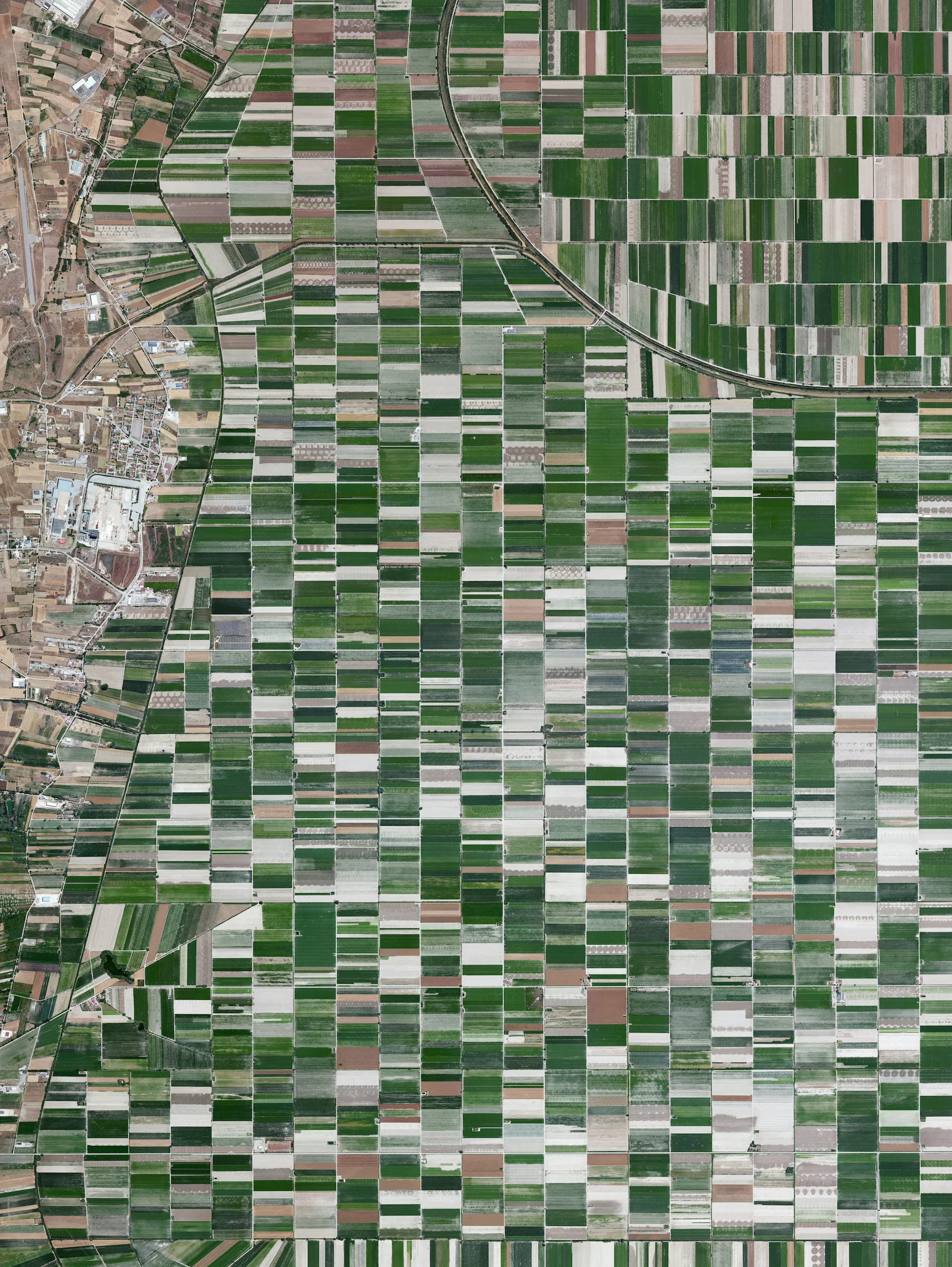 4/13/2016 Plain of Fucino Abruzzo, Italy 42.0043709, 13.5290608 The plain of Fucino in the Abruzzo region of Italy is commonly recognized for the quality of the vegetables that are grown here - in particular the potatoes, carrots, and radishes. What is now an entire plain filled with farms was once Fucine Lake, the third largest lake in Italy. The lake was drained in 1877 to make agricultural development possible here, an area that is now responsible for roughly 25% of the agricultural production in the region.