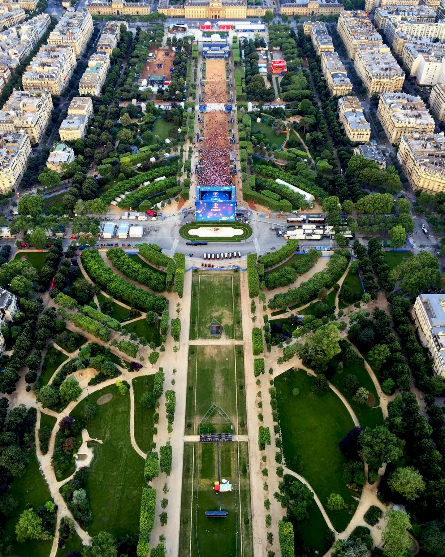 Check out this incredible overview from the top of the Eiffel Tower in Paris, France. This shot captures the Euro 2016 Fan Zone at Champ de Mars and was taken by our friend Kayla Bernardino. The quarterfinals of the tournament are currently underway with a match today between Wales and Belgium. If you are ever in Paris, the Eiffel Tower offers the highest vantage point in the city, rising 1,063 feet (324 meters).