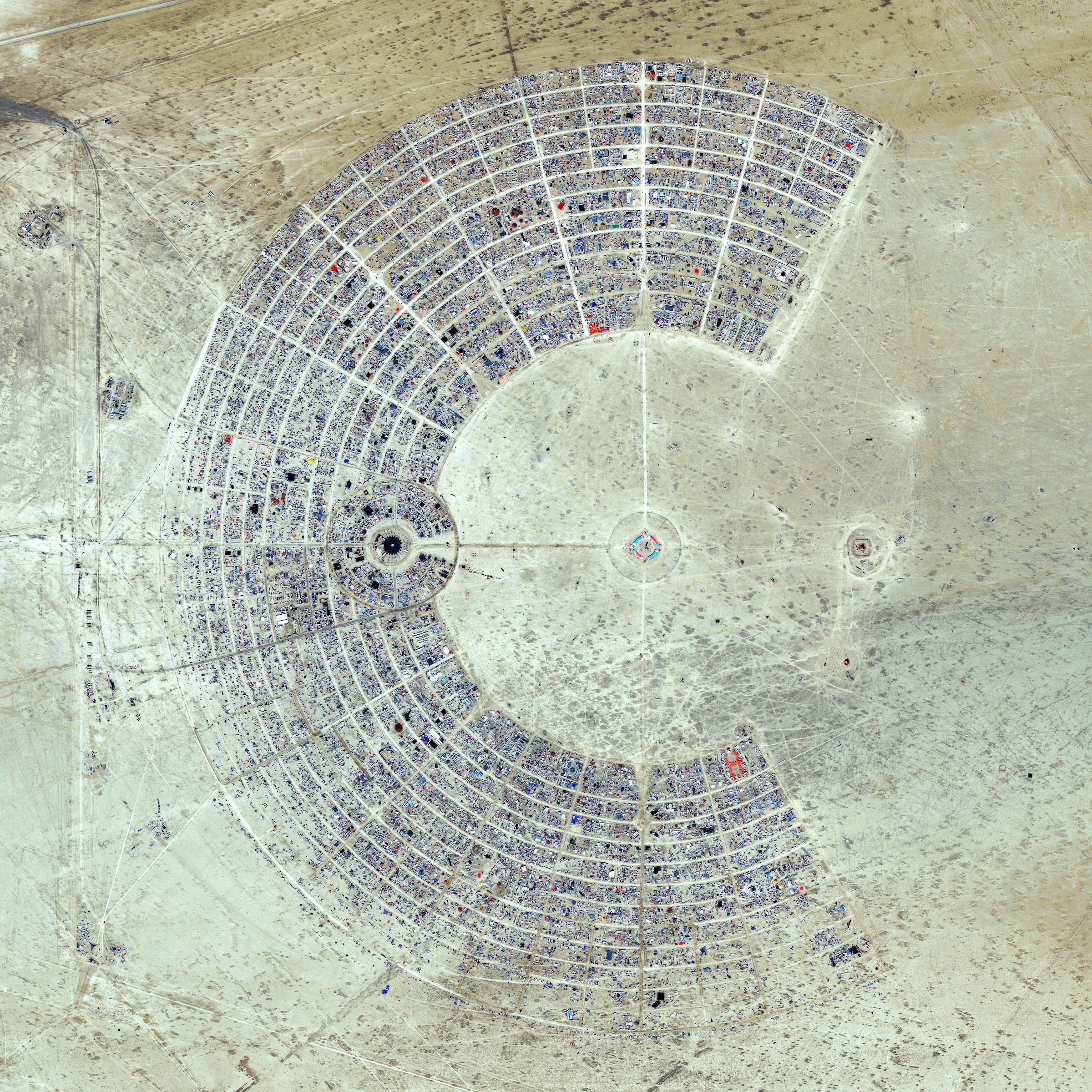 8/25/2016 Burning Man Black Rock City, Nevada, USA 40°47′13″N 119°12′16″W Over the next few days, thousands of people from around the world will head to the desert in Nevada, USA to construct Black Rock City. Laid out in a grid plan with radiating avenues named after the numbers on a clock, the city serves as home to roughly 60,000 people for Burning Man, an annual week-long event. Burning Man is described as an experiment in community, art, self-expression, and radical self-reliance. Additionally residents in Black Rock City practice one of the event's key principles of ‘Leave No Trace’ – meaning significant efforts are taken to make sure as the city is disassembled in the days following the festival, the desert returns to its original state.