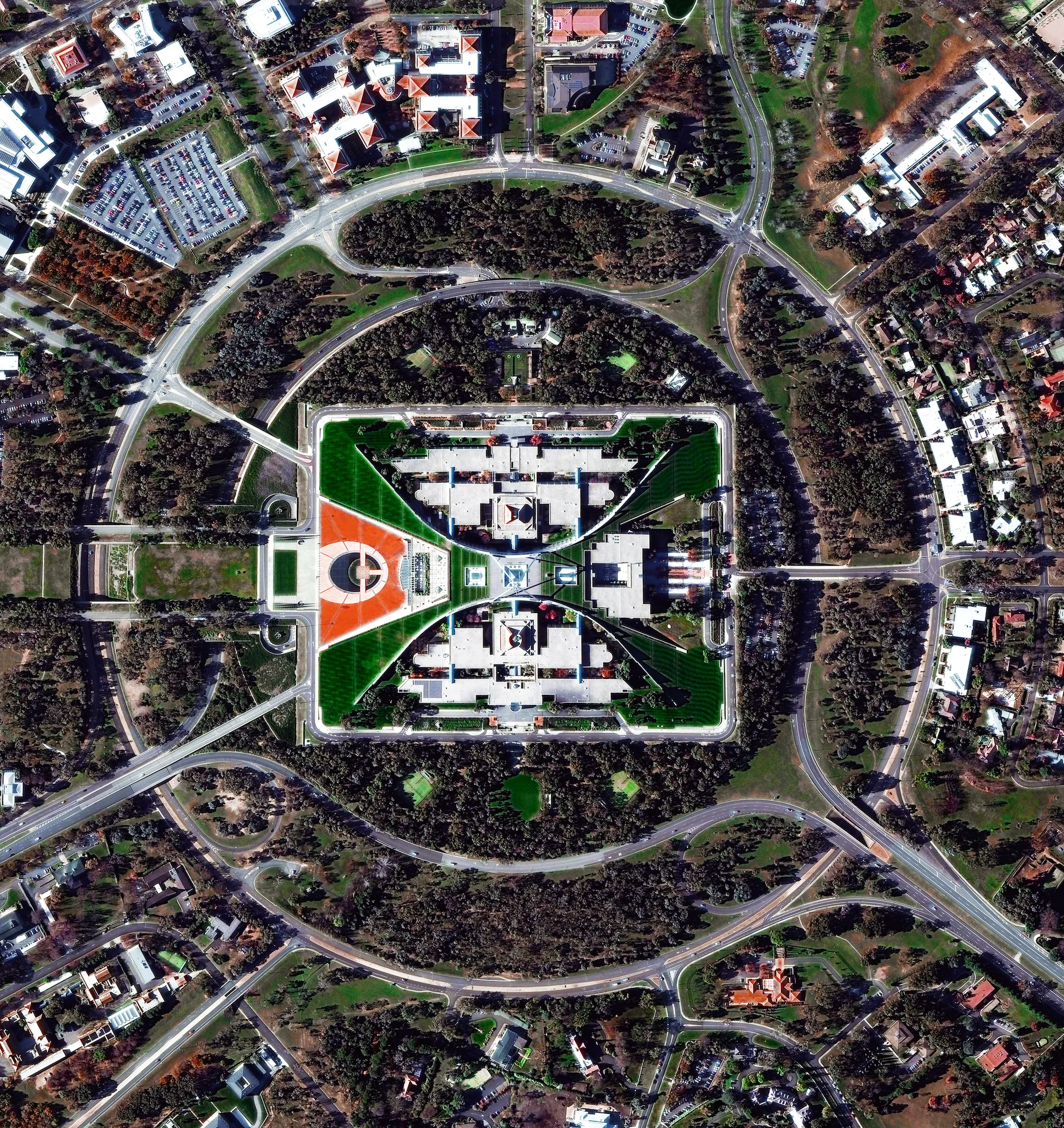 8/27/2016 Capital Hill Canberra, Australia 35°18′29″S 149°07′28″E The construction of Parliament House in Canberra, Australia involved the removal of the top half of Capital Hill (the mound on which the structure was built). After the project was completed, much of the displaced earth was replaced on top of the building where a lush, green lawn now grows. While much of Canberra was designed by by Walter Burley Griffin in 1913, this specific complex opened in 1988, is designed to look like two boomerangs, and contains approximately 4,400 rooms.