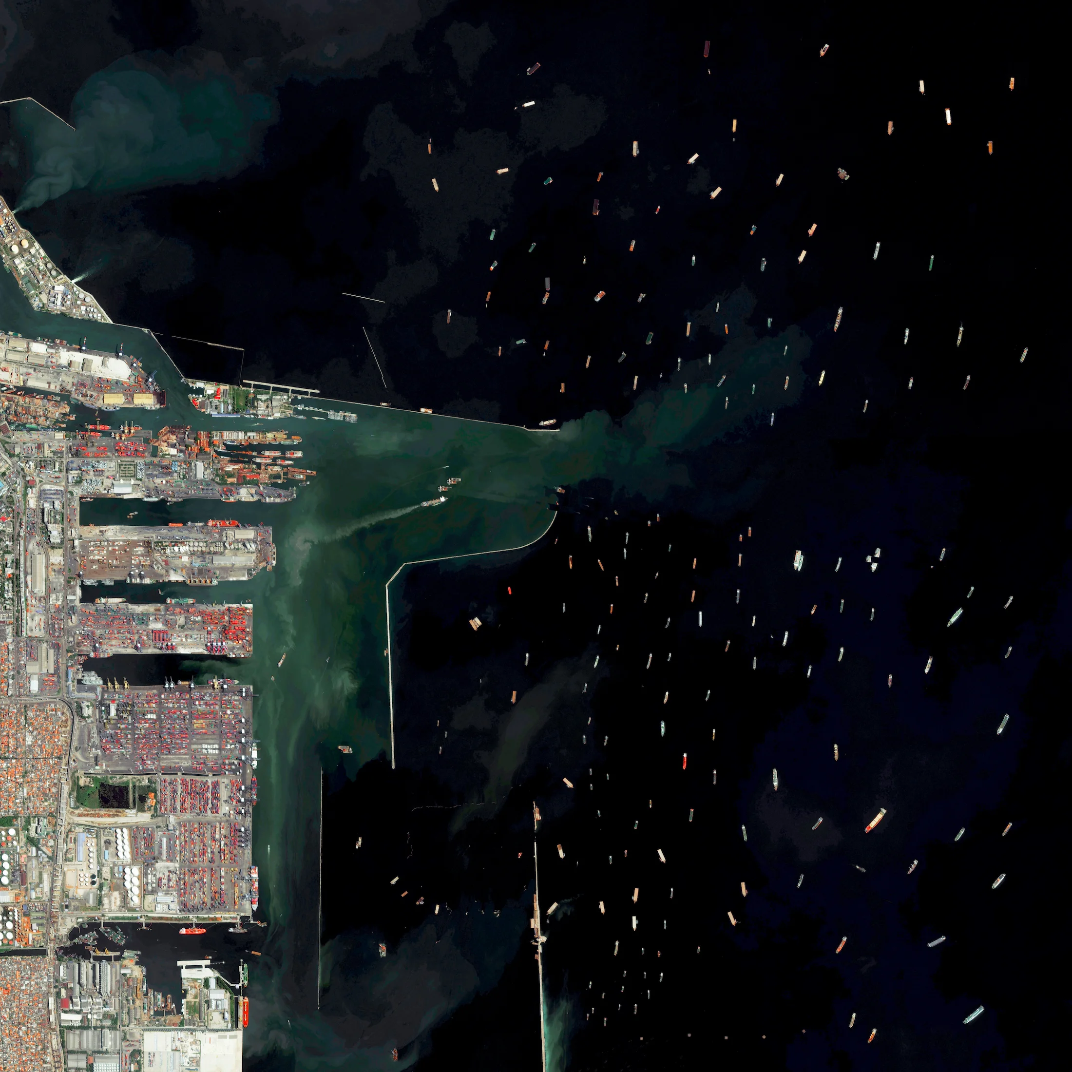 8/31/2016 Port of Tanjung Priok Jakarta, Indonesia 6.104°S 106.8865°E Dozens of massive cargo ships and tankers - some weighing up to 300,000 tons - are anchored outside the Port of Tanjung Priok in Jakarta, Indonesia. The facility is the country's busiest and most advanced seaport, handling more than 50% of Indonesia's trans-shipment cargo. The port is also among the least efficient in all of Southeast Asia, due to slow customs handling and limited docking capacity.