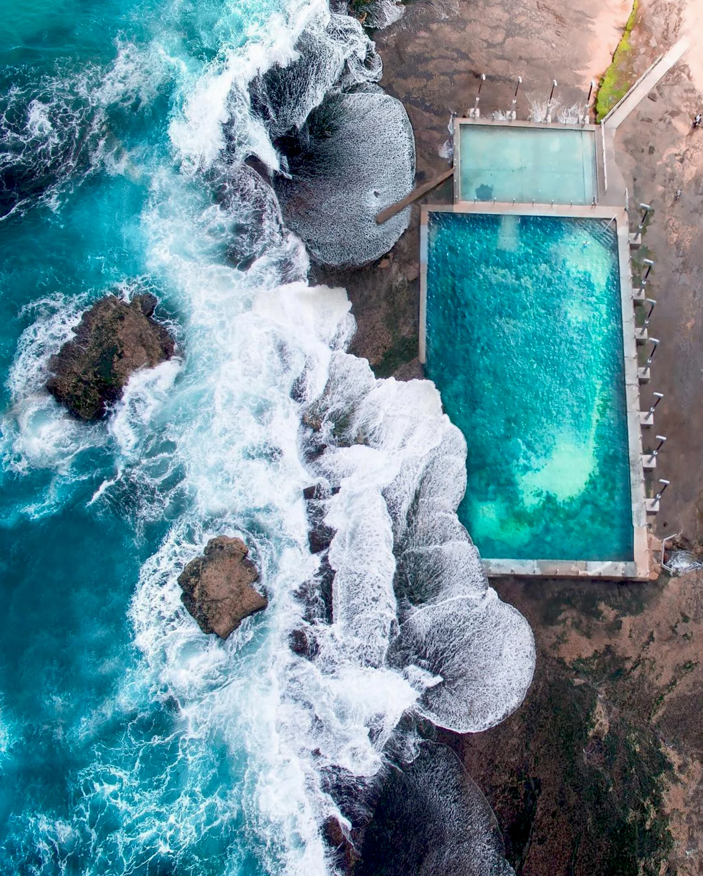 10/13/2016 Mona Vale Beach Pool Mona Vale, NSW, Australia -33.6787655, 151.3160979 Check out this incredible shot of the ocean pool at Mona Vale Beach, located in the suburbs of Sydney, Australia. There are a number of public ocean pools in New South Wales, offering stunning areas to swim, situated on the rocky coast, with waves splashing into the pool. Drone photographer: @gabscanu