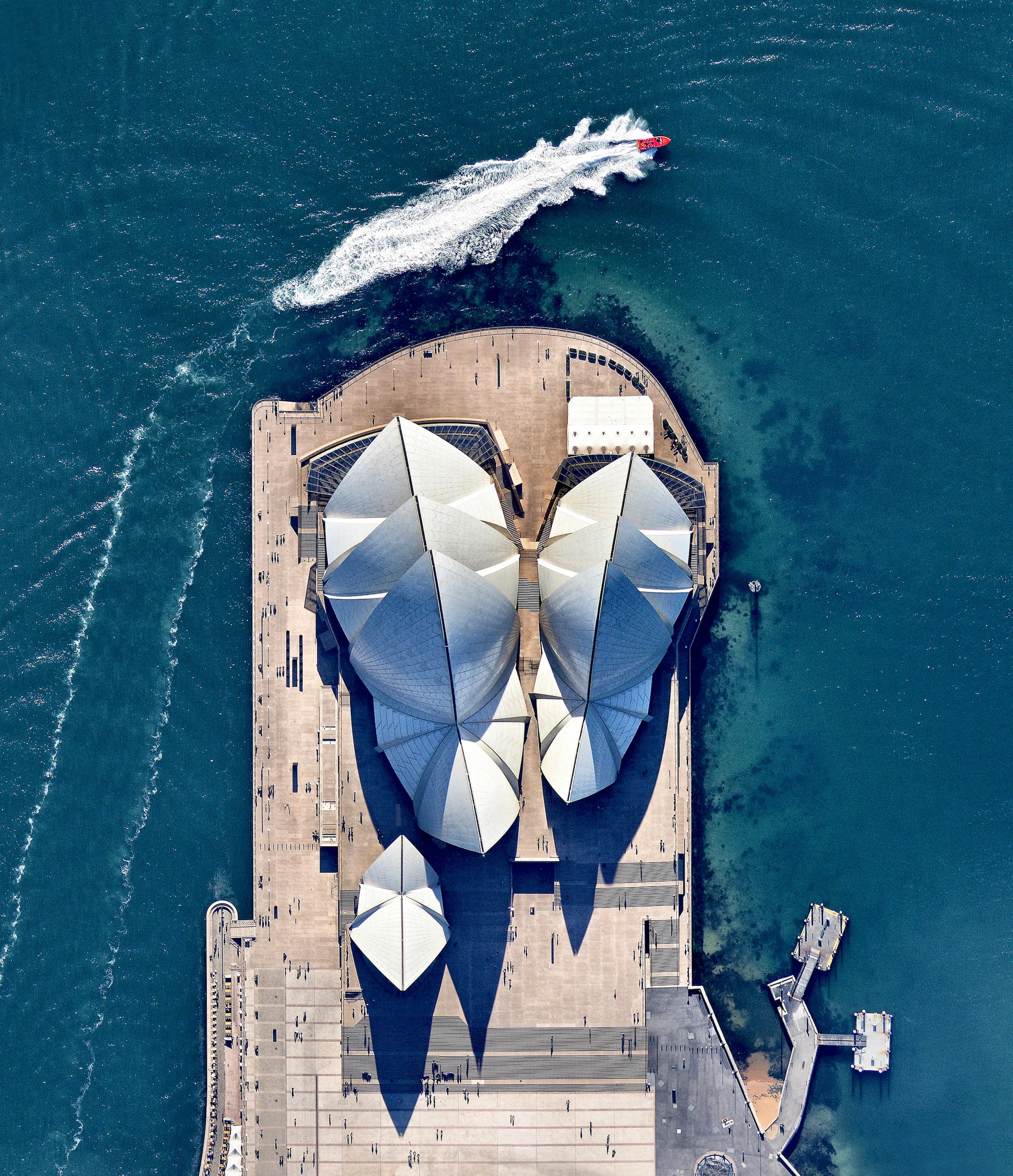10/20/2016 Sydney Opera House Sydney, Australia 33°51′31.2″S 151°12′50.5″E The Sydney Opera House hosts more than 1,500 shows each year in its various performance halls, drawing a total attendance of approximately 1.2 million people. While the buildings famous “shell” design appears uniformly white from a distance, it actually features a subtle chevron pattern composed of tiles in two colors: glossy white and matte cream. Source imagery; Nearmap
