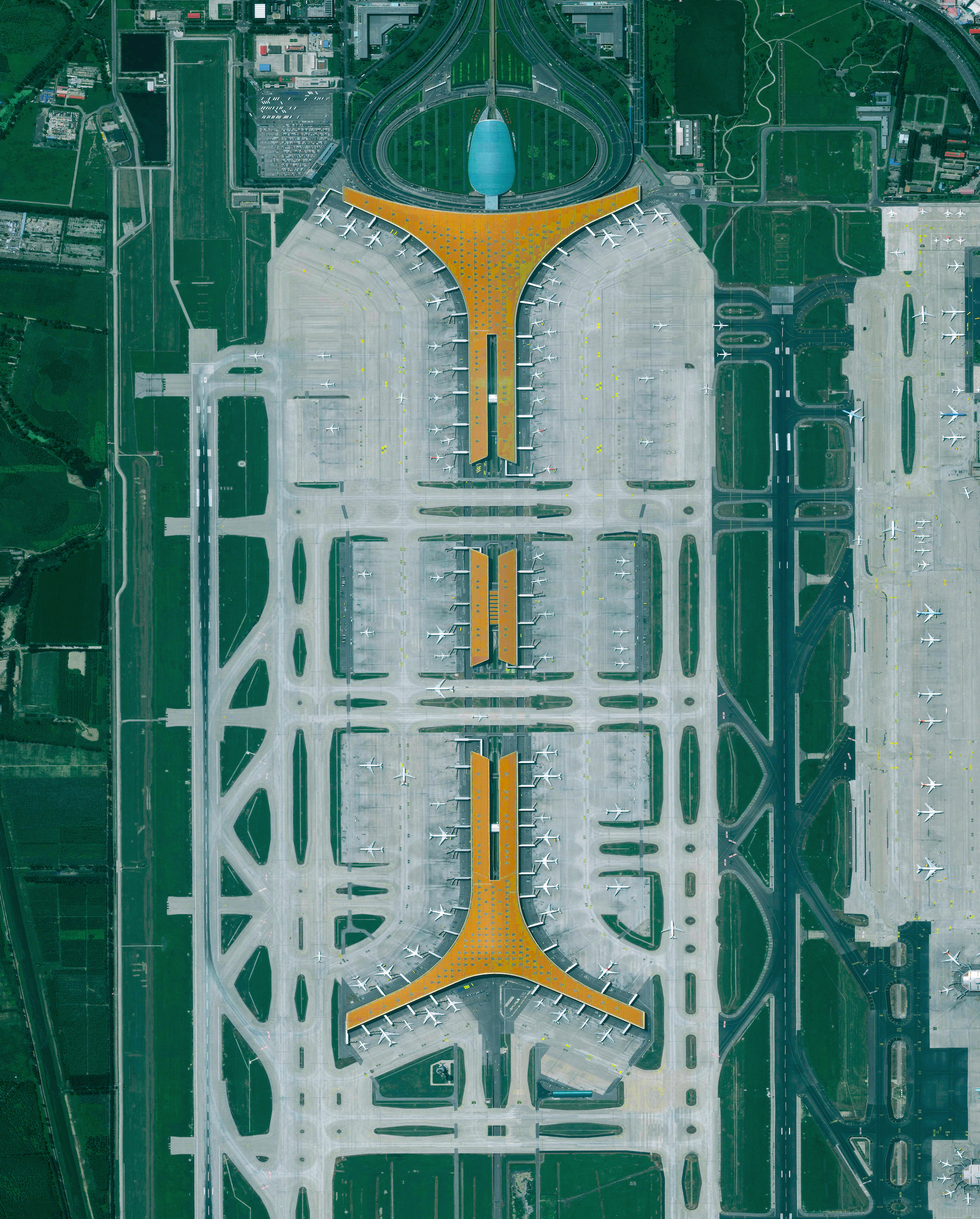 11/16/2016 Beijing Capital International Airport Beijing, China 40°04′21″N 116°35′51″E Beijing Capital International Airport is the second busiest airport in the world, handling more than 90 million passengers every year. The dragon-like layout of the terminals is meant to celebrate the thrill and poetry of flight, while the orange roof evokes the vibrant coloration of the city’s famed Forbidden City.