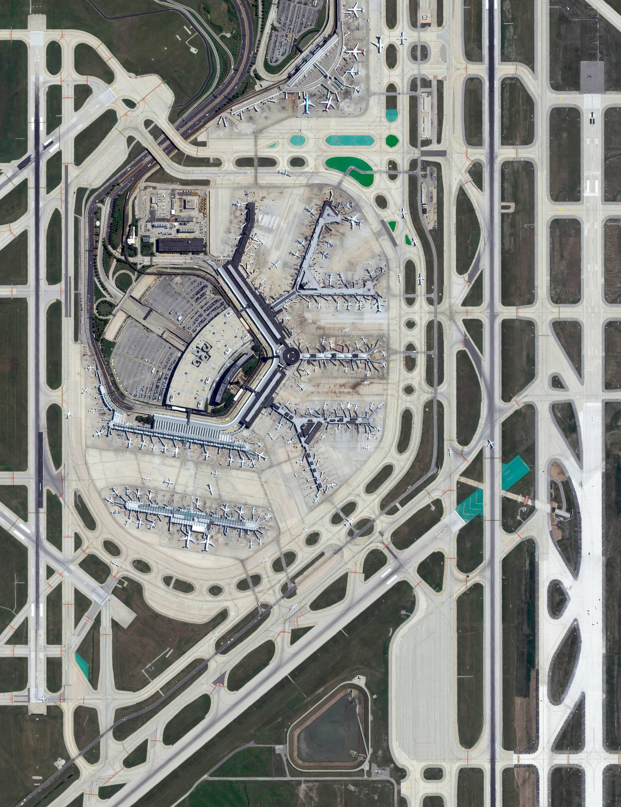 12/23/2016 Chicago O'Hare International Airport Chicago, Illinois, USA 41°58′43″N 87°54′17″W Today is expected to the busiest travel day of the year in advance of this weekend’s holidays. In the United States alone, more than 103 million people are expected to be travel more than 50 miles this week. Chicago O’Hare International Airport, seen in this Overview, is the fourth-busiest airport in the world and is expected to handle the majority of the ~ 4.5 million people flying to and from Chicago, Illinois this weekend. Whether you are in the air, on the road, or safe at home, I hope you all have a joyous and wonderful holiday!