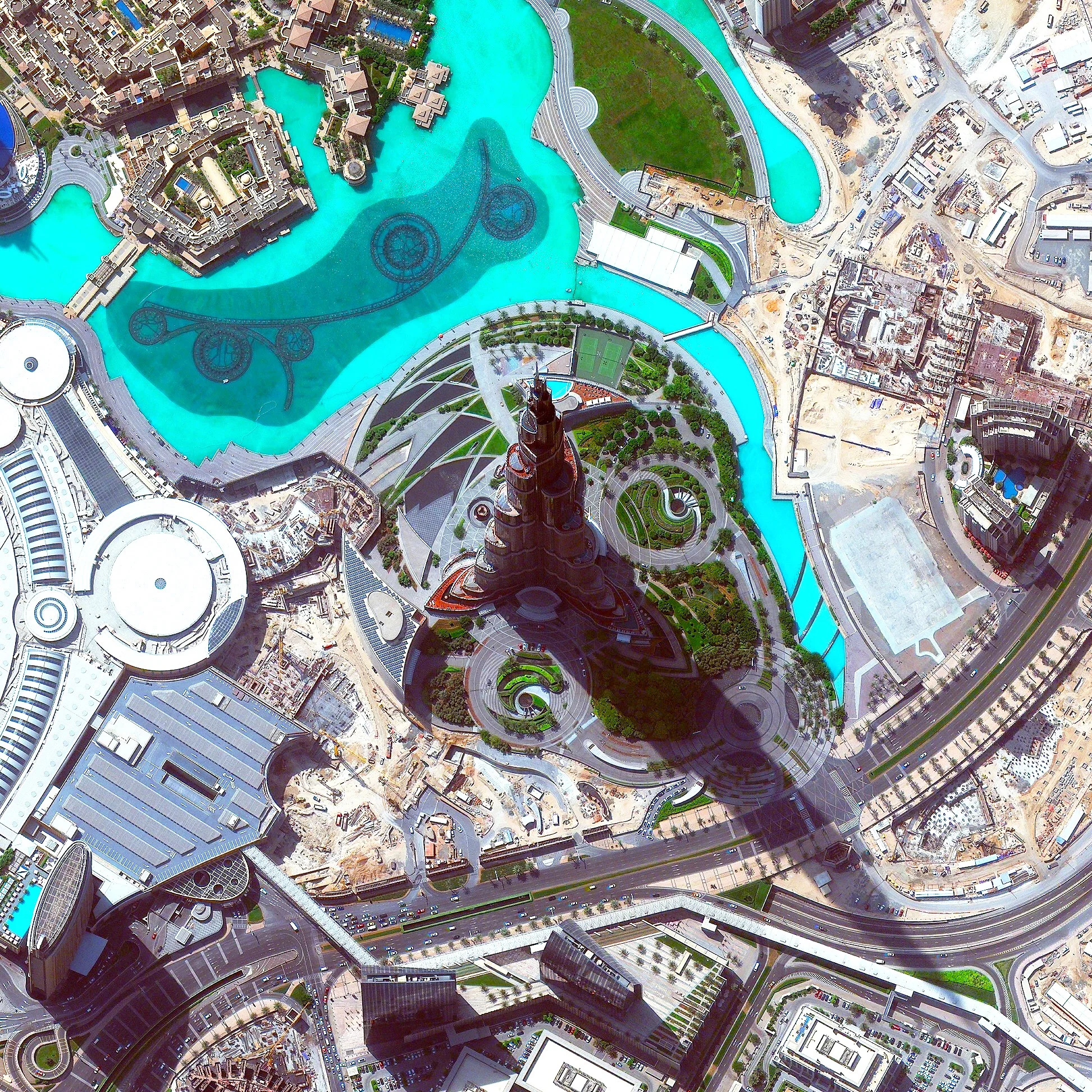 3/7/2017 Burj Khalifa Dubai, United Arab Emirates 25°11′49.7″N 55°16′26.8″E Standing at 2,717 feet (828m), the Burj Khalifa in Dubai, UAE is the tallest building in the world (and casts quite a long shadow!). The design of the 163-floor structure is an abstraction of the Hymenocallis, a type of desert flower that has long petals extending from its center. The building has been very well received since it opened in 2010; however, its construction was very controversial as it was built primarily by workers from South Asia and East Asia who earned low wages and were housed in abysmal conditions.