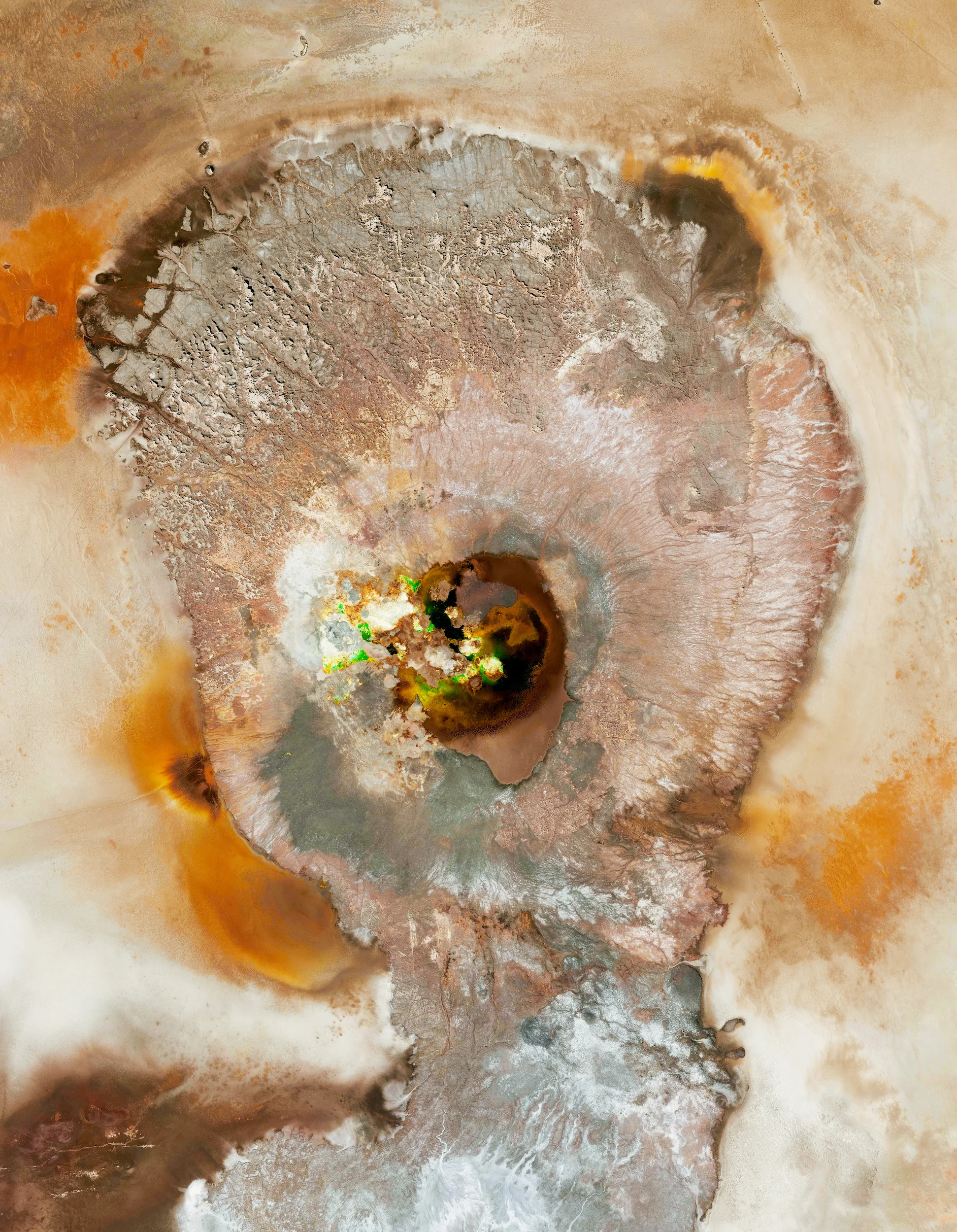 3/15/2015 Danakil Depression Afar, Ethiopia 14.2402588,40.298674 The Danakil Depression is located in the Afar Region of Ethiopia. It lies on the junction of three tectonic plates and is the hottest region on Earth in terms of year-round temperatures. The Dallol crater, seen here, was formed by the intrusion of basaltic magma into salt deposits and subsequent hydrothermal activity. Any microorganisms living here would be categorized as 'extremophilic microbes' and are of major interest to the scientists studying the area to better understand how life might occur on other planets.