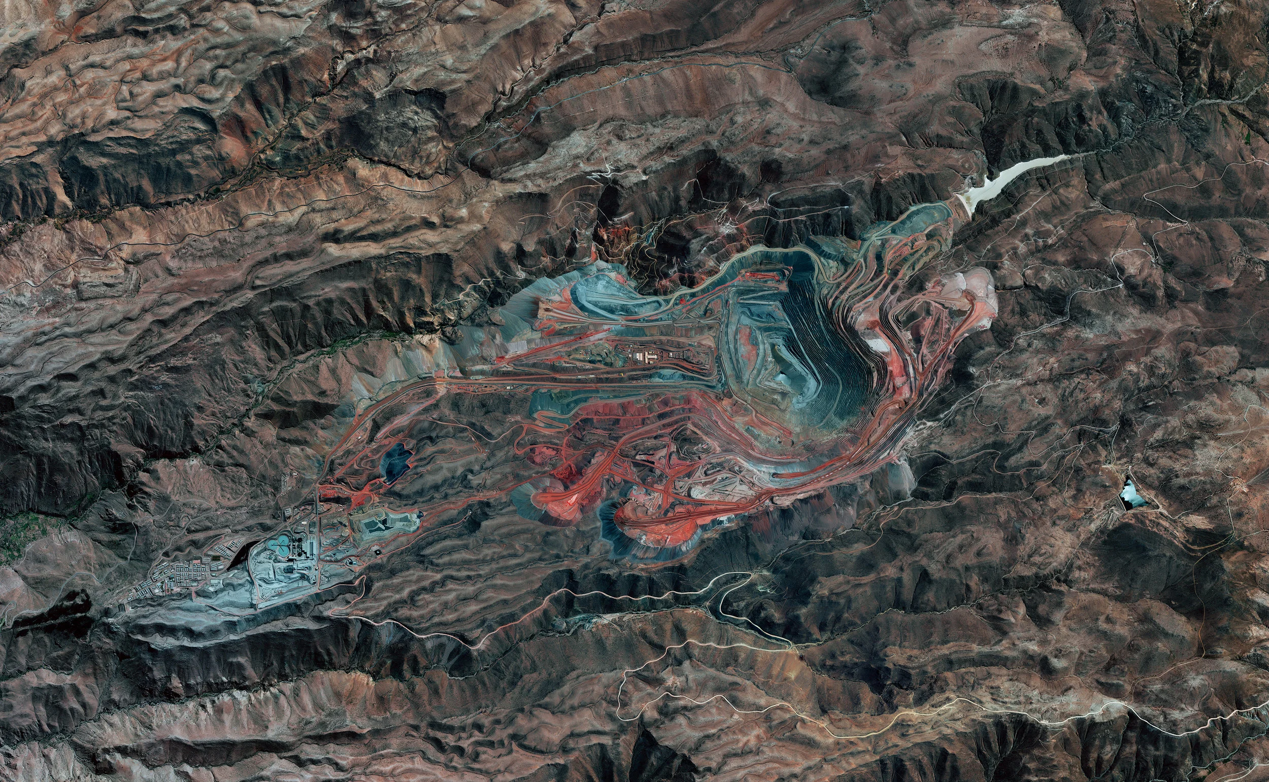 5/3/2017 The Cuajone Mine, Peru Peruvian Andes, Peru -17.060772, -70.729159 The Cuajone Mine is located near the district of Torata, in the southern range of the Peruvian Andes. The mine is best known for its copper deposits, but it other materials such as silver, zinc, and molybdenum have been extracted there as well. Operations began in 1970, and by 2009 accounted for 16% of the country's copper production. Source imagery: DigitalGlobe
