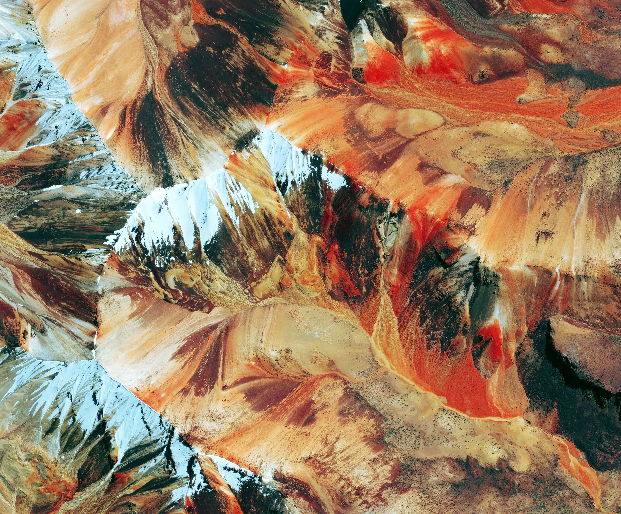 3/27/2017 Sand patterns in Salta Salta, Argentina -22.821924, -65.030245 Sand patterns are seen here in Salta, Argentina. Salta is situated 3780 feet above sea level in the northwest part of the country. The palette of colors in the sand is caused for a variety of reasons. The red occurs from large amounts of iron in the sand that have broken down, and stained the sand a rust color. The black presumably occurs following volcanic activity. The white seen in this Overview is snow covering the tops of the mountains. Source imagery: DigitalGlobe