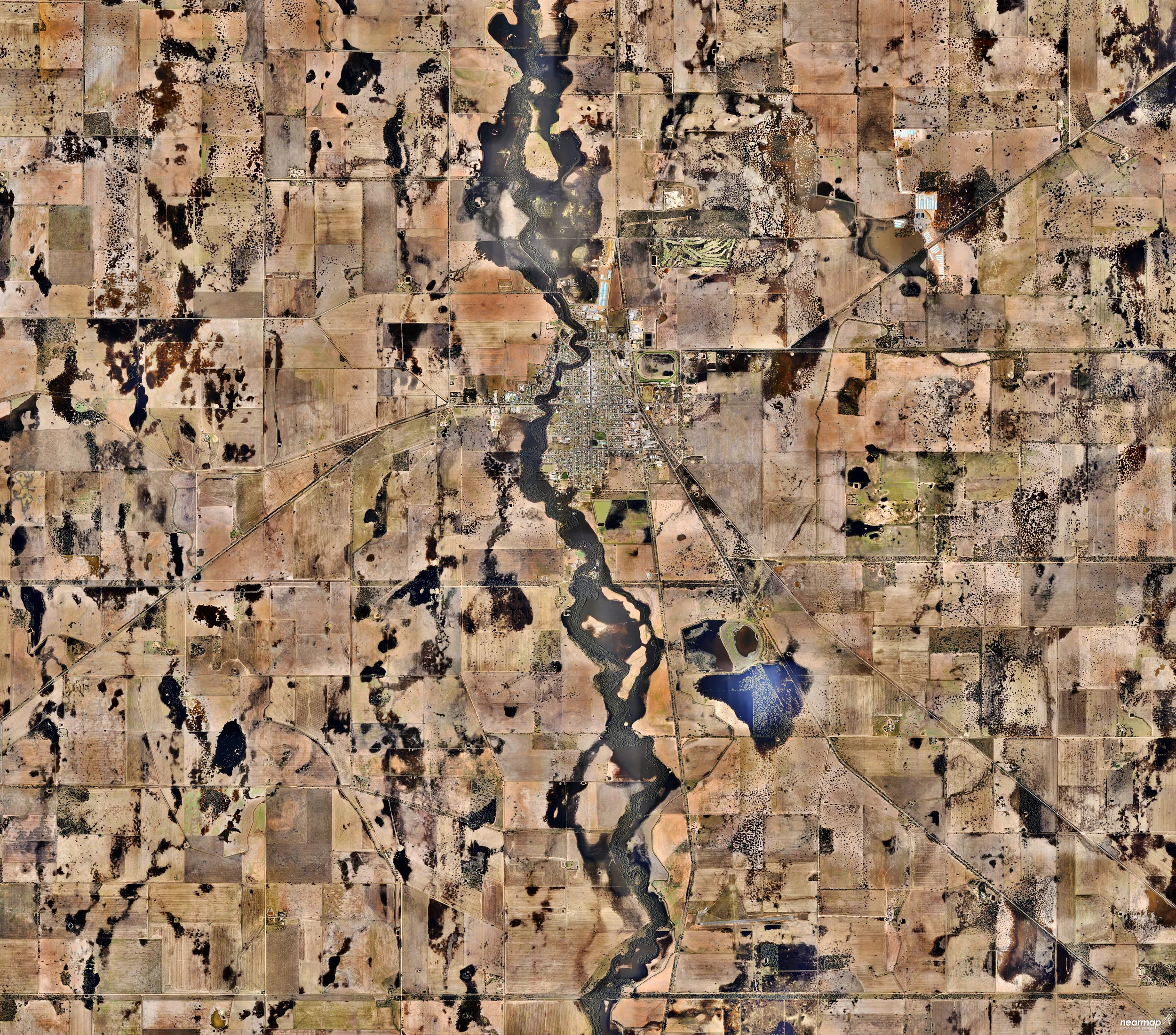 4/16/2017 Warracknabeal Victoria, Australia -36.255902, 142.395859 Warracknabeal is a town located in the Australian state of Victoria, roughly 205 miles north-west of Melbourne. The small town of 2,745 people has a yearly Easter tradition called the “Y-Fest” that features activities such as a street parade, golf tournament, and waterski spectacular. Source imagery: NearMap