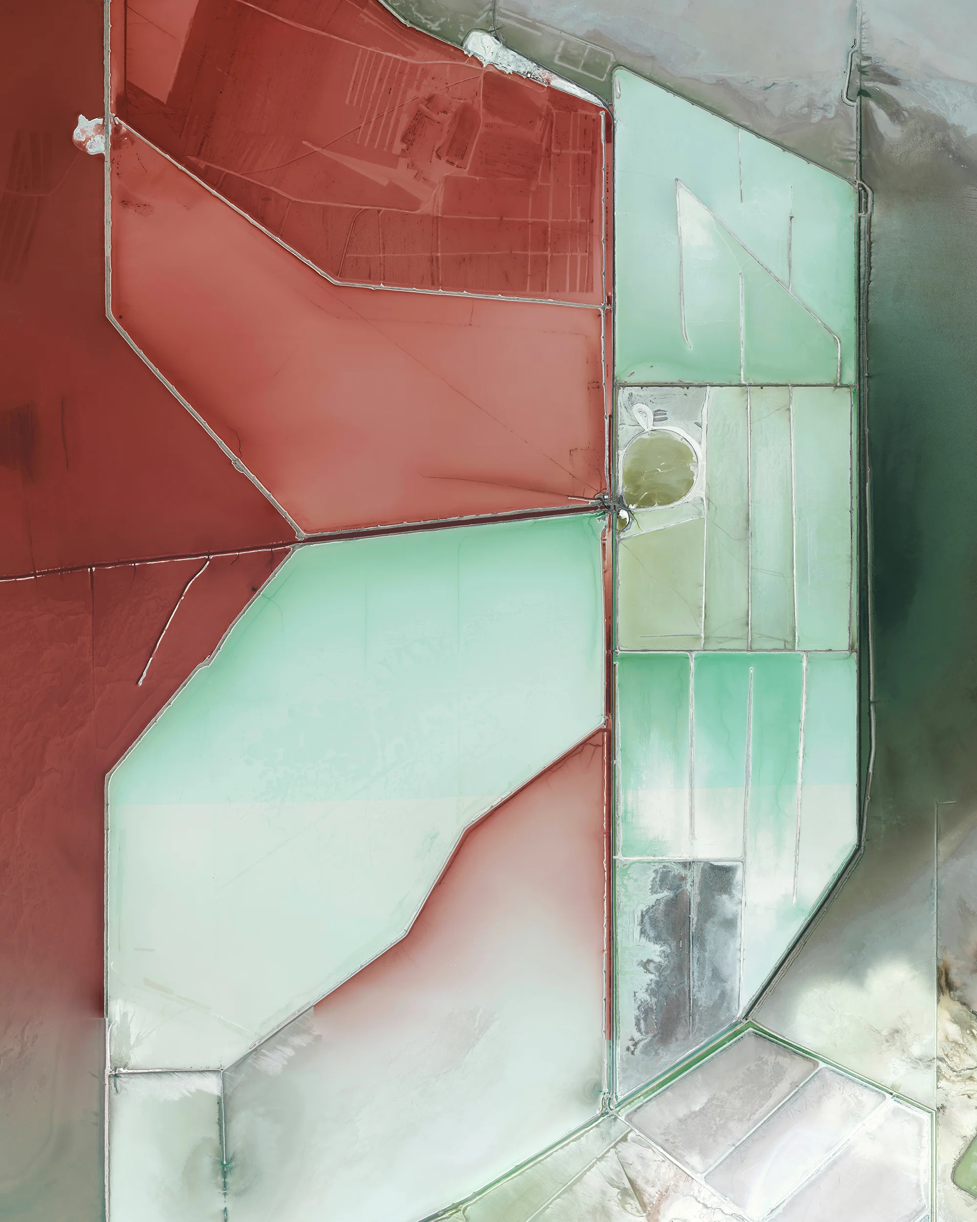 4/28/2017 Evaporation ponds Great Salt Lake, Utah 40.792726, -112.592892 Evaporation ponds in the Great Salt Lake, Utah are pictured in this Overview. The Great Salt Lake contributes an estimated $1.3 billion annually to Utah’s economy, including $1.1 billion from industry, which is mostly due to mineral extraction. Minerals extracted from the lake include sodium chloride, potassium sulfate, and magnesium-chloride. Source imagery: DigitalGlobe