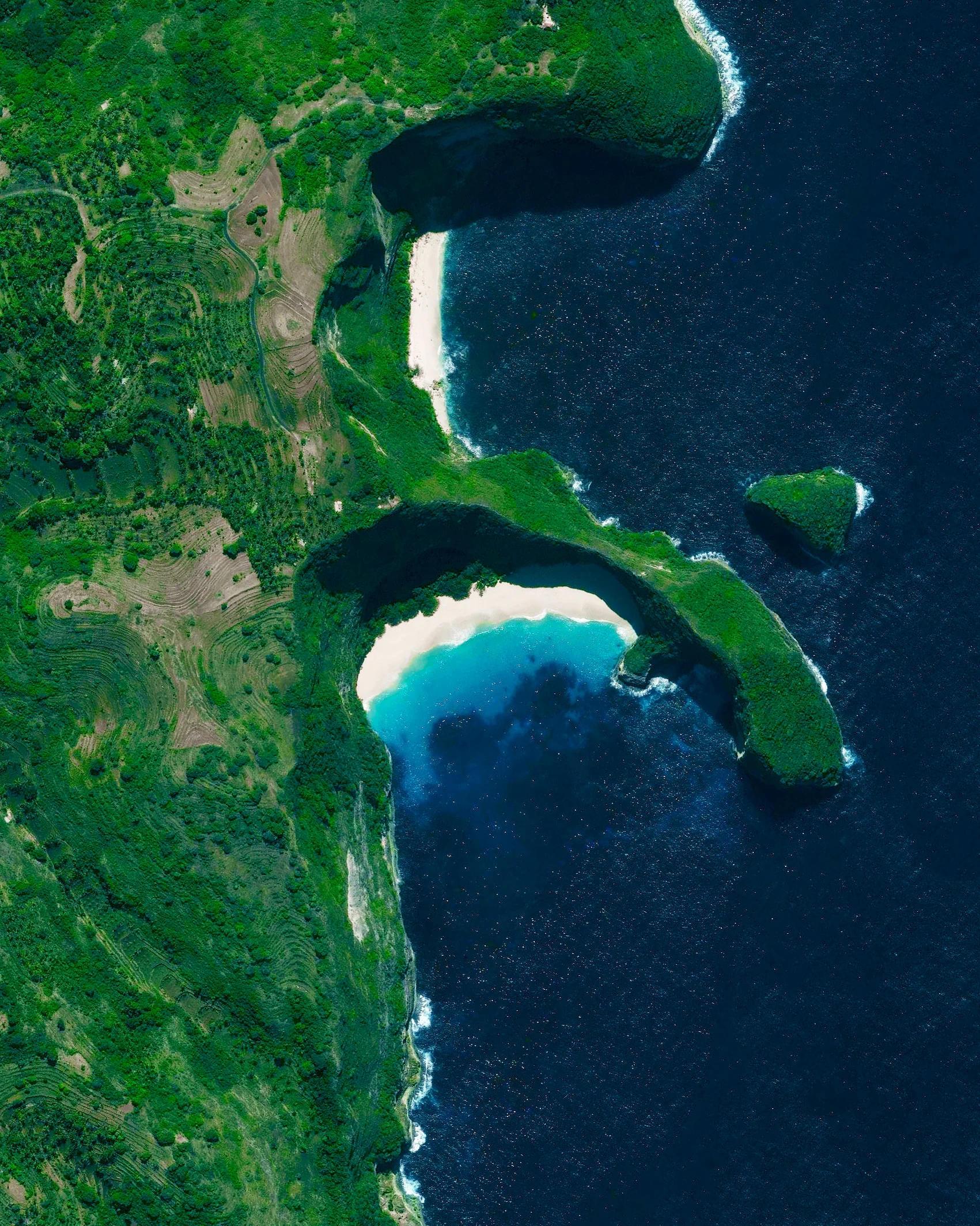 5/10/2017 Nusa Penida Bali, Indonesia -8.752065, 115.473136 Two secluded beaches are seen on the island of Nusa Penida, located off the southeastern coast of Bali. The island has come to be the unofficial bird sanctuary for numbers of endangered Balinese and Indonesian bird species, most notably the Bali Starlin. Source imagery: DigitalGlobe