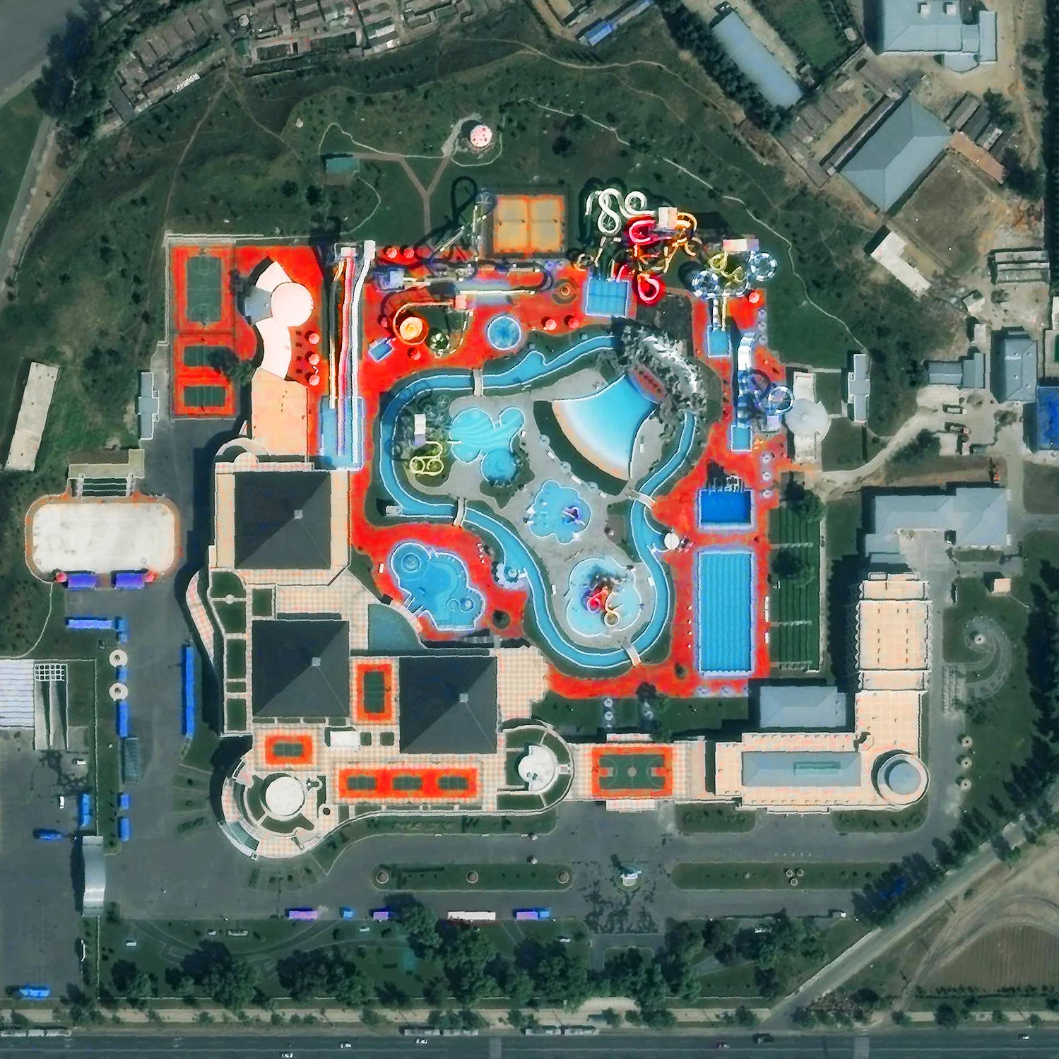 Munsu Water Park is located in Pyongyang, North Korea. The facility is open year-round with water slides, indoor and outdoor swimming pools, various sport courts, and a rock climbing wall. 39.039177°, 125.780009°