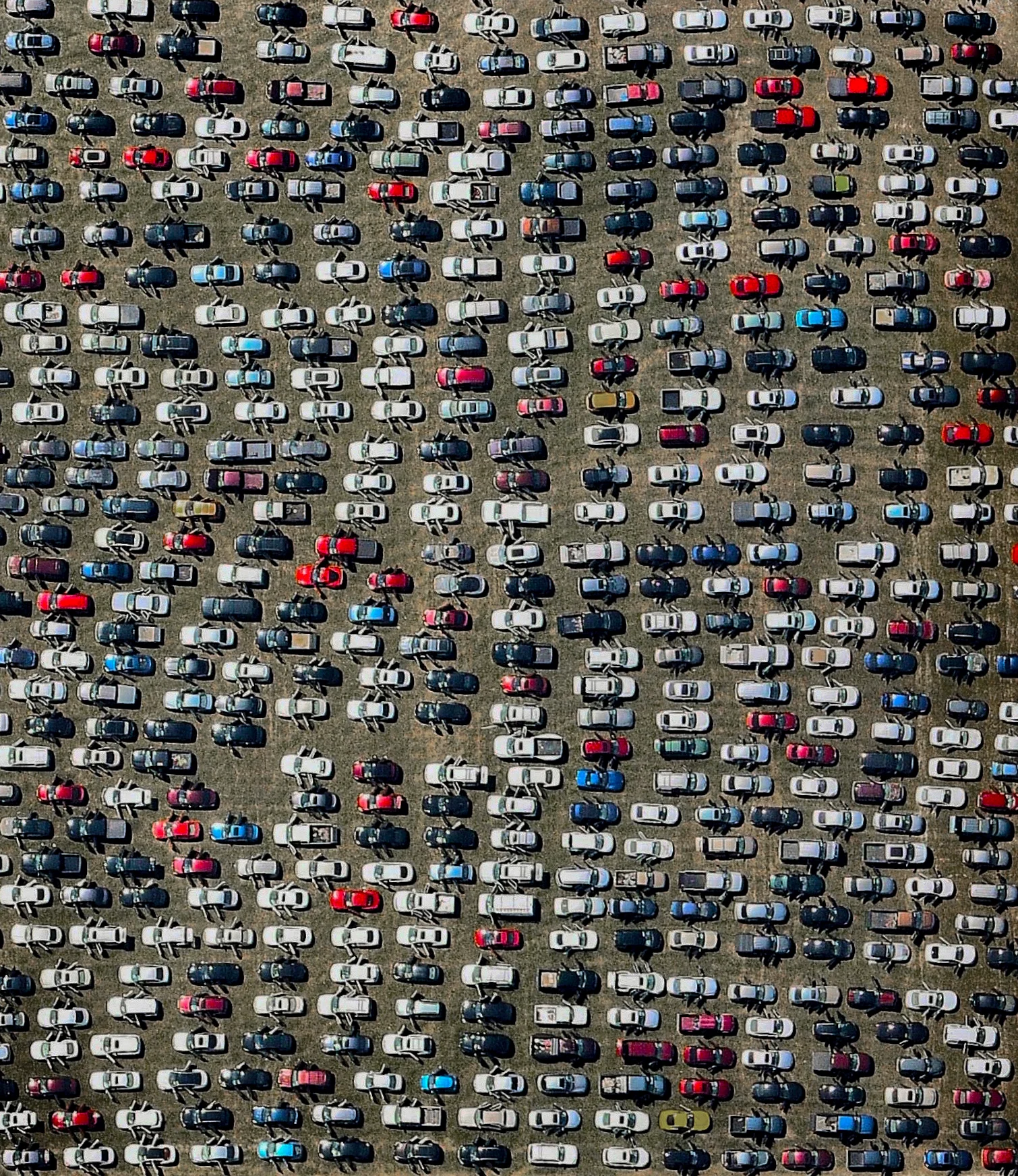 Hundreds of abandoned cars that were damaged by Hurricane Harvey are seen at the Royal Purple Raceway in Houston, Texas, USA. It is estimated that 30,000 now fill the lot and more than a half a million cars were damaged by the storm’s floodwaters. The cars will remain here until insurance adjusters assess the damage and process claims for each vehicle. 29.786157, -94.878034