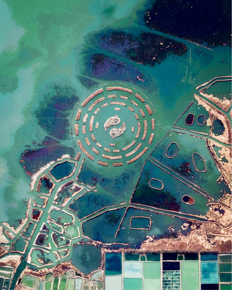 An earth-formed Bagua arrangement is pictured amid the shallow waters of Changdang Lake, in China’s Jiangsu Province. An important symbol in Taoist cosmology, the Bagua consists of a yin-yang surrounded by eight sets of three-line patterns. This particular arrangement, known as “Later Heaven,” is symbolic of achieving balance and accepting change as time passes. 31°38'51.8"N 119°32'00.8"E Source imagery: DigitalGlobe
