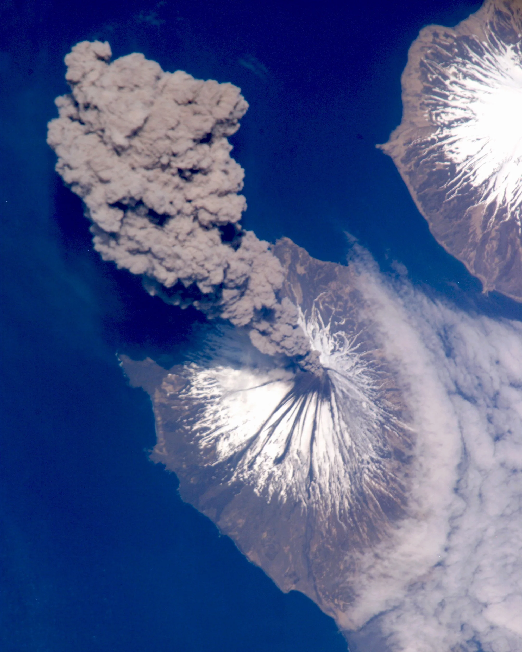 Check out this incredible shot, which shows the eruption of Cleveland Volcano in Alaska’s Aleutian Islands. It was captured in May 2006 by an Expedition 13 crew member aboard the International Space Station. Mount Cleveland is one of the most active volcanoes in the Aleutian Arc, having erupted an estimated 22 times in the last 230 years. 52°49'18.1"N 169°56'48.0"W Image courtesy of: NASA
