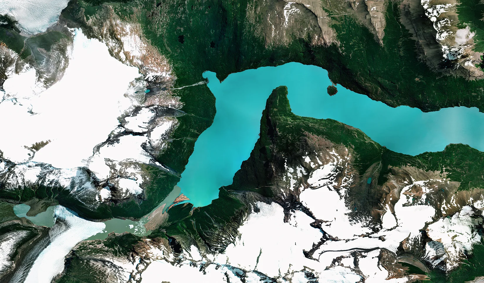 Lago Argentino is the largest freshwater lake in Argentina, with a surface area of 546 square miles (1,415 square kilometers). Located in the Patagonia region on Argentina’s southern tip, it is fed by glacial meltwater from several nearby rivers. Due to its position within Los Glaciares National Park, the lake is also a popular tourism and fishing site. 50°13′S, 72°25′W Source imagery: DigitalGlobe