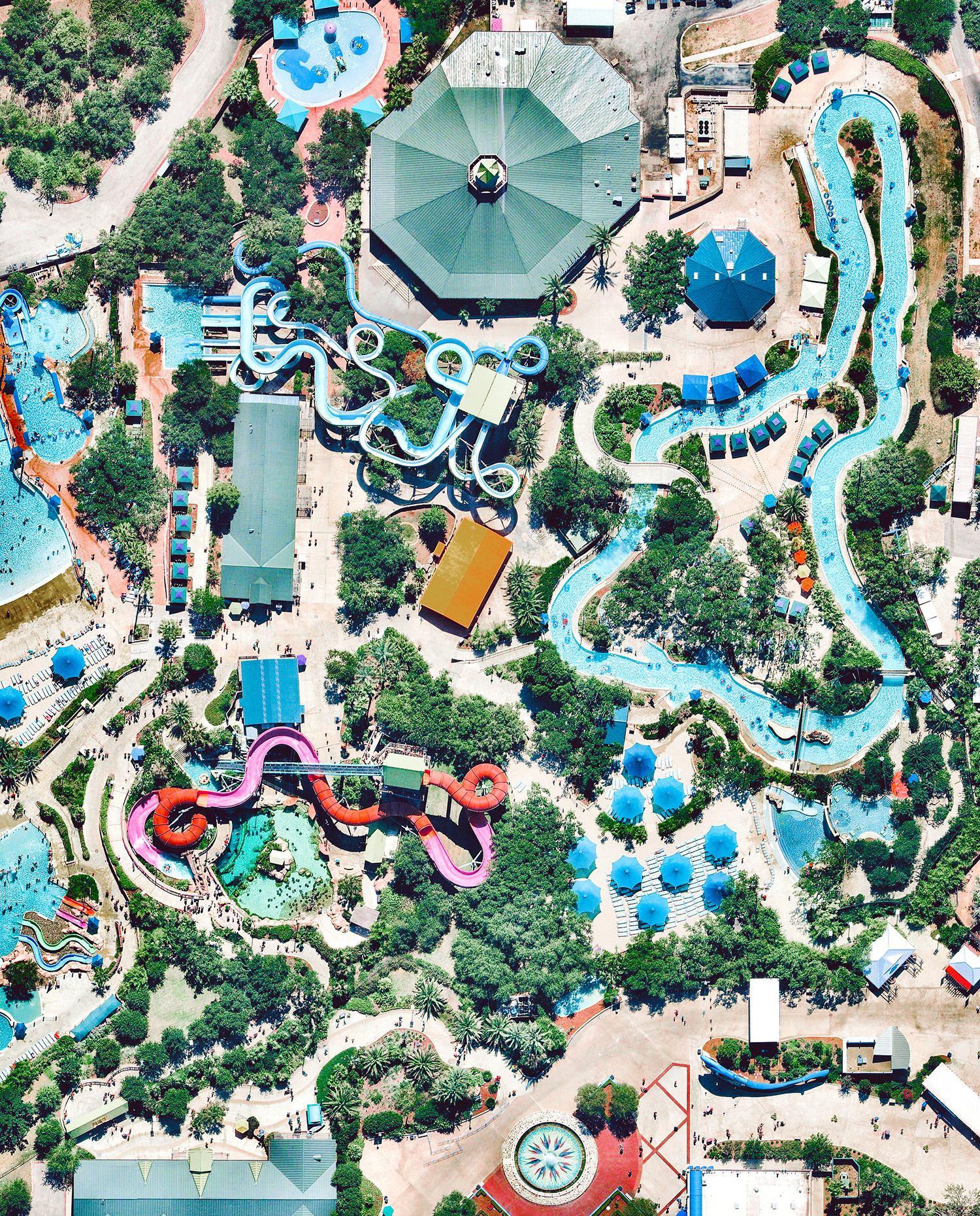 Check out this Overview of Aquatica, a water park in San Antonio, Texas. Constructed in 2012, Aquatica boasts several water slides, pools, a 42,000-square-foot beach area, an aviary, and its signature “Stingray Falls,” a family raft ride that runs through an underground grotto full of stingrays and tropical fish. 29°27'30.3"N, 98°41'53.3"W Source imagery: Nearmap