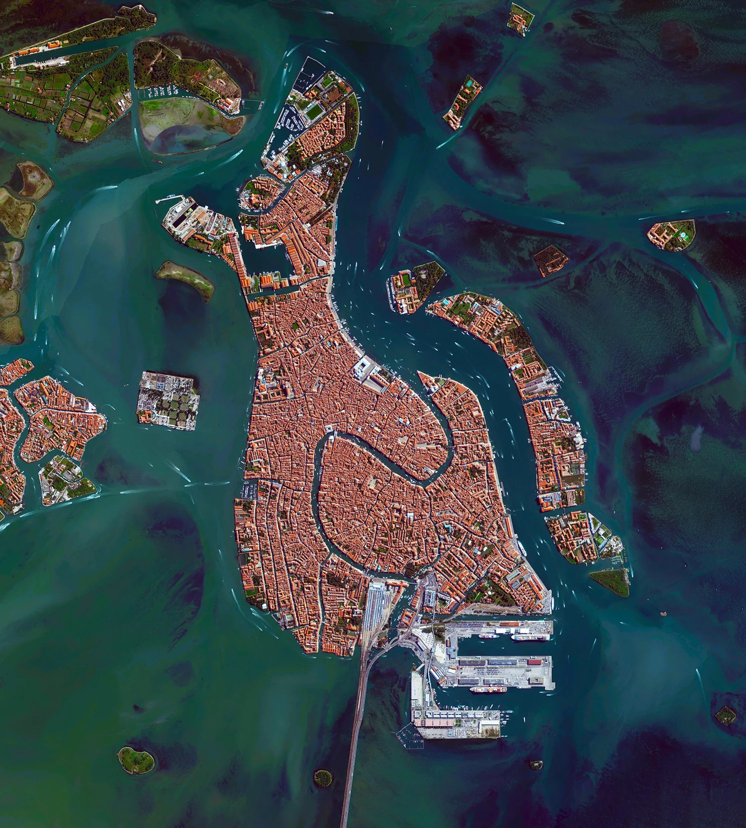 Venice, Italy, is situated upon 118 small islands that are separated by canals and linked by bridges. With tide waters expected to rise to perilous levels in the coming decades, the city has constructed 78 giant steel gates across the three inlets through which water from the Adriatic could surge into Venice’s lagoon. The panels — which weigh 300 tons and are 92ft wide and 65ft high — are fixed to massive concrete bases dug into the seabed. 45°26′15″N, 12°20′9″E Source imagery: DigitalGlobe