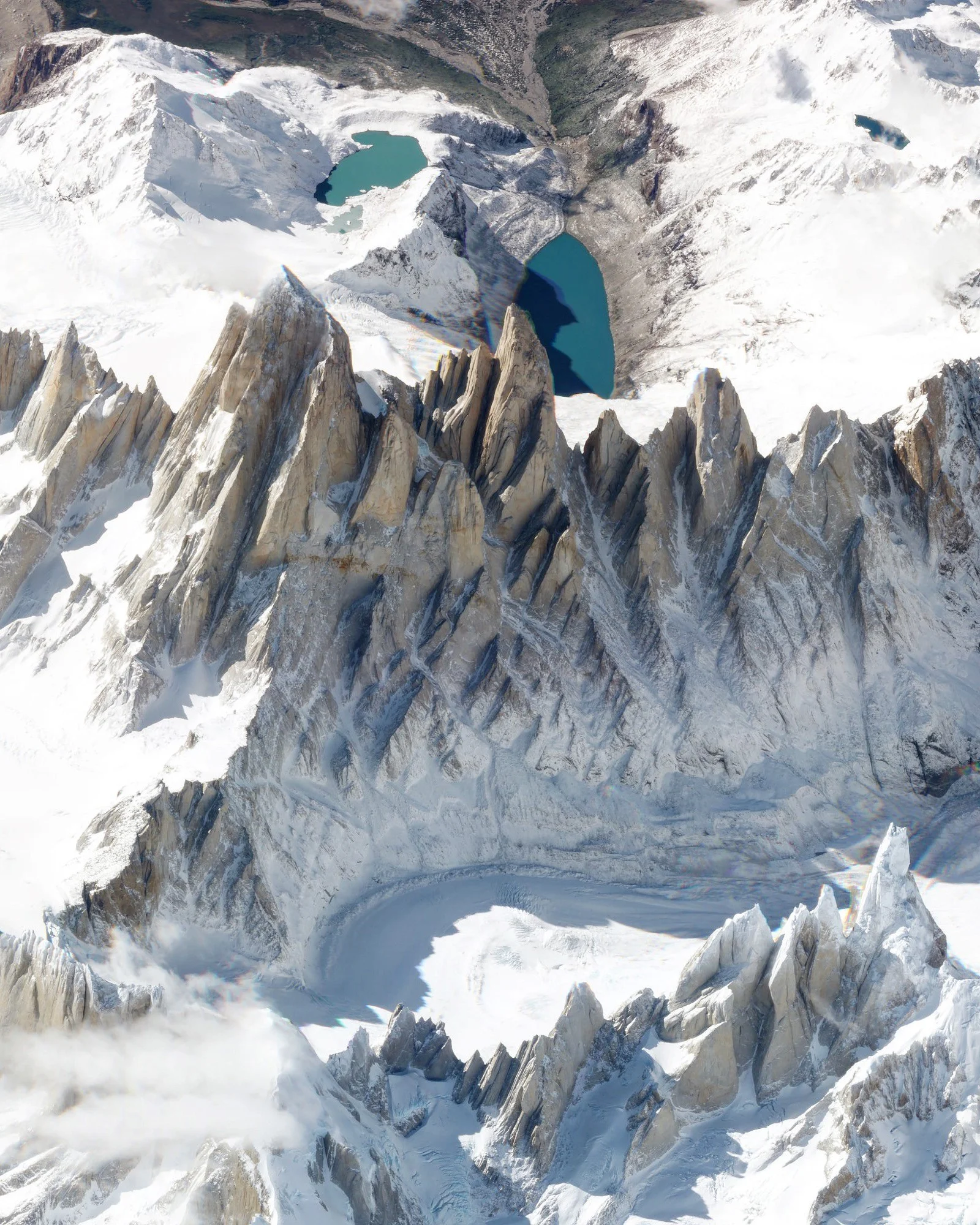 Check out this amazing view of Monte Fitz Roy — a mountain in the Patagonia Region on the border of Argentina and Chile — captured by a Planet Labs satellite at a low angle. With an elevation of 11,171 ft (3,405 m) and sheer granite faces, it is one of the most technically challenging mountains to ascent on Earth. Monte Fitz Roy is also the inspiration for the Patagonia clothing company's logo. 49°16'17.1"S, 73°02'33.9"W Source imagery: Planet Labs