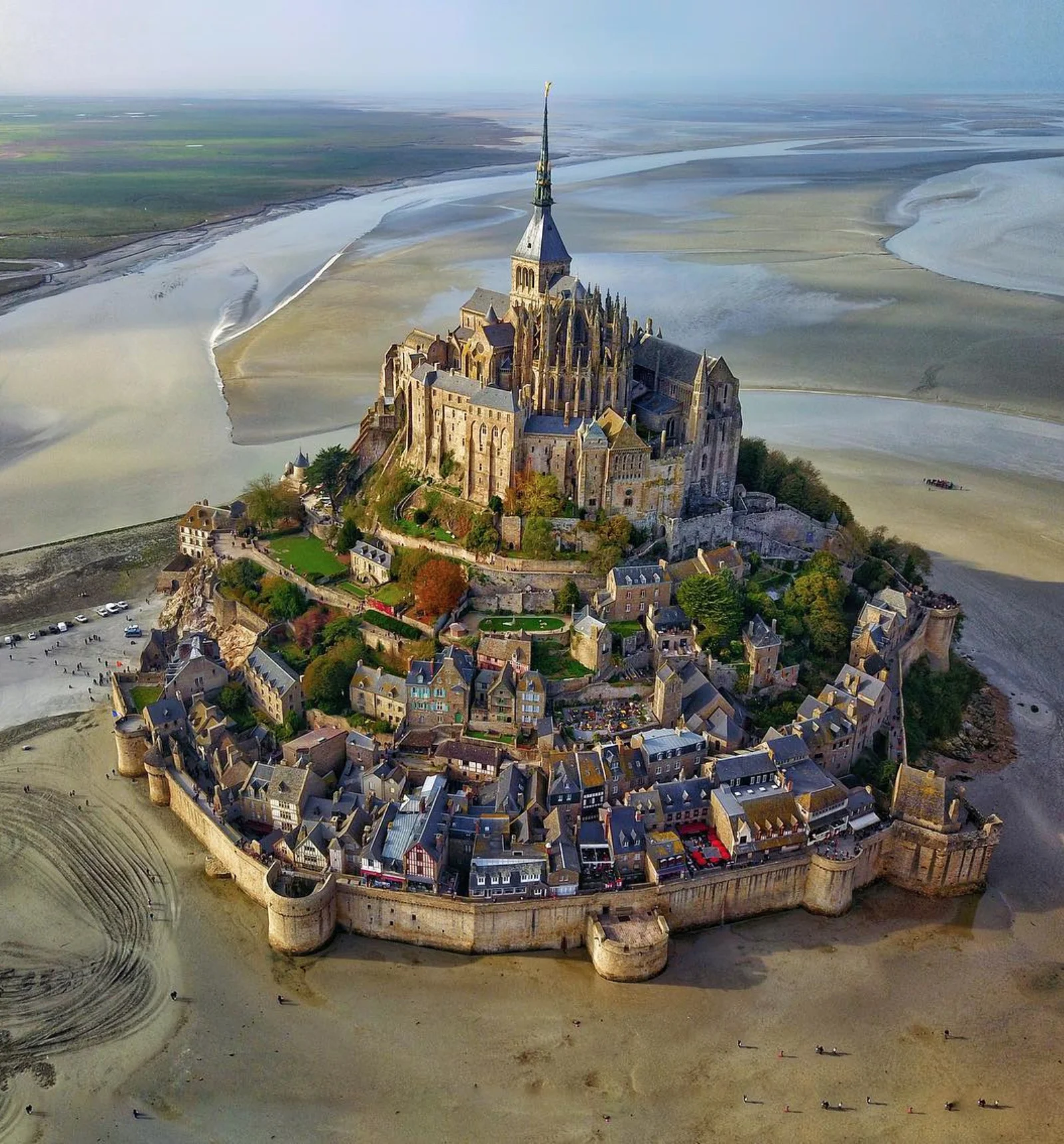 This week’s “Drone Sunday” post from From Where I Drone gives us an incredible view of Mont St. Michel in Normandy, France. Over the past 600 years, the island has functioned as a prominent monastery (accessible to pilgrims only during low tide), a French military fortification, and a prison. Follow From Where I Drone for more incredible drone photos! 48°38'09.6"N, 1°30'41.0"W Source imagery: @secretagent_wesanderson