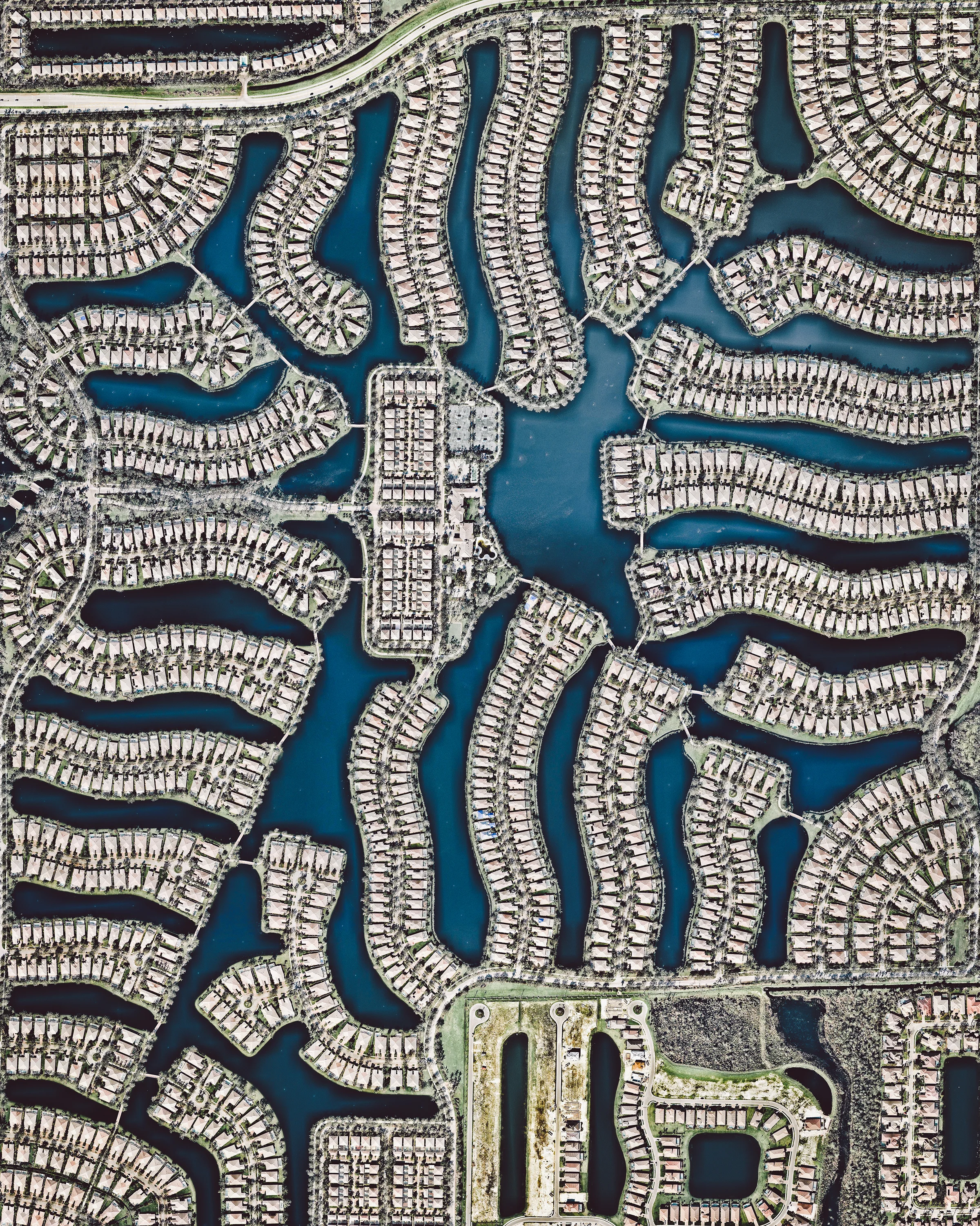 The Island Walk neighborhood in Naples, Florida, is home to slightly more than 3,000 people. Since many cities in the state of Florida contain master-planned communities — often built on top of waterways in the latter half of the twentieth century — a number of intricate designs like this one are visible from the Overview perspective. 26°15'05.0"N, 81°42'36.9"W Source imagery: Nearmap