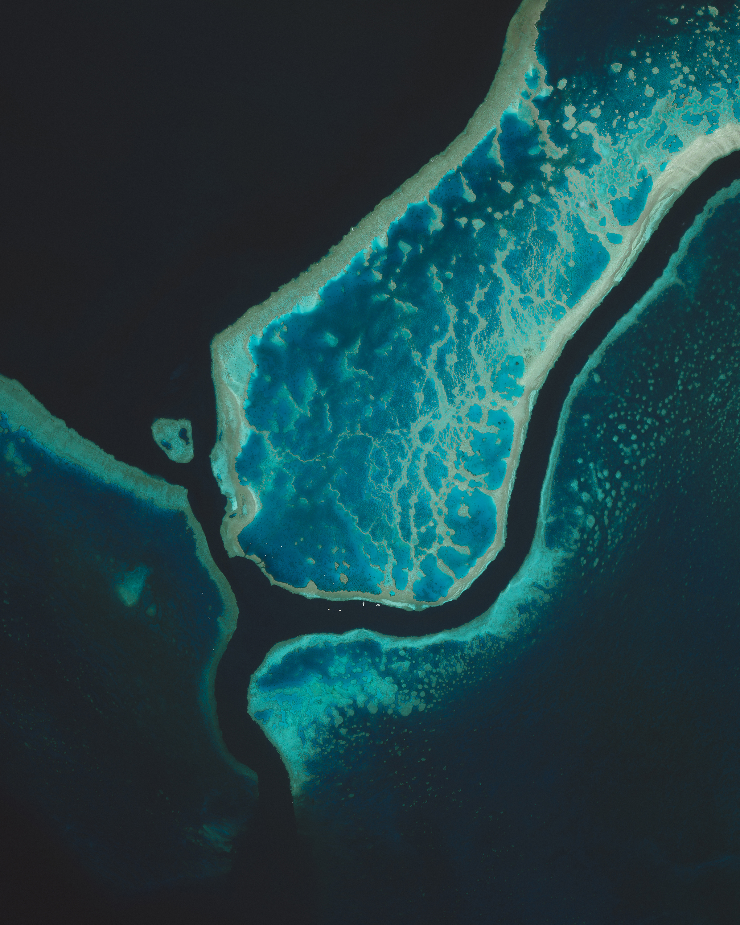 This Overview captures a small segment of the Great Barrier Reef, located off the coast of Queensland, in northeastern Australia. Composed of more than 2,900 individual reefs and 900 islands, the reef system is Earth's largest structure made up of living things. The Great Barrier Reef stretches for more than 1,400 miles (2,300 km) and covers an area of roughly 130,000 square miles (344,400 sq. km). 18°17'10.0"S, 147°42'00.0"E Source imagery: DigitalGlobe