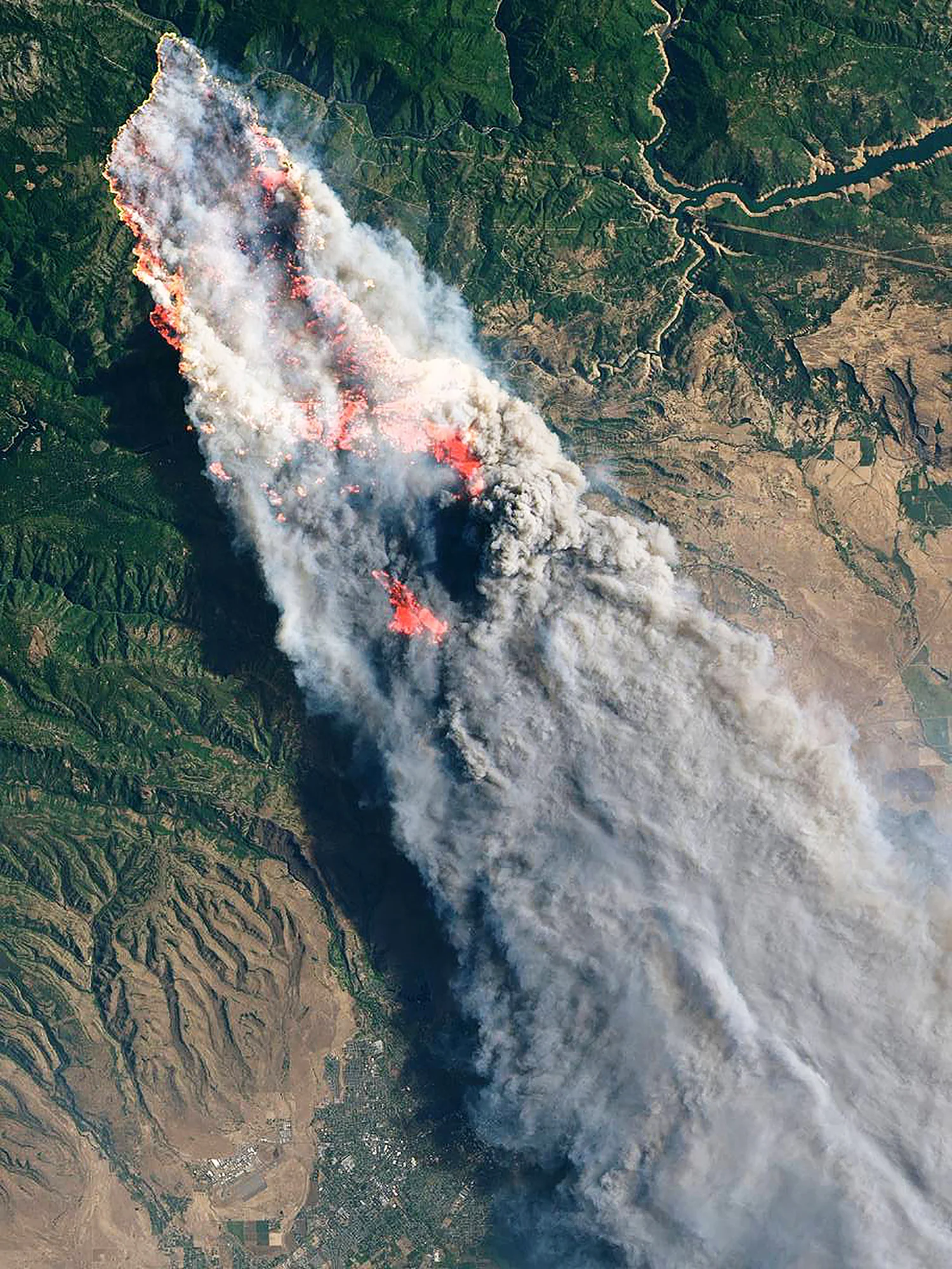 The Camp Fire, which is currently burning in Northern California, has become the deadliest wildfire in state history with a death toll of 42 as of this morning. The blaze has scorched more than 117,000 acres (47,000 hectares), destroyed more than 7,000 structures and forced 52,000 people to evacuate their homes. The fire is roughly 30 percent contained at the moment. 39°45'41.6"N, 121°36'25.1"W Source imagery: NASA - National Aeronautics and Space Administration