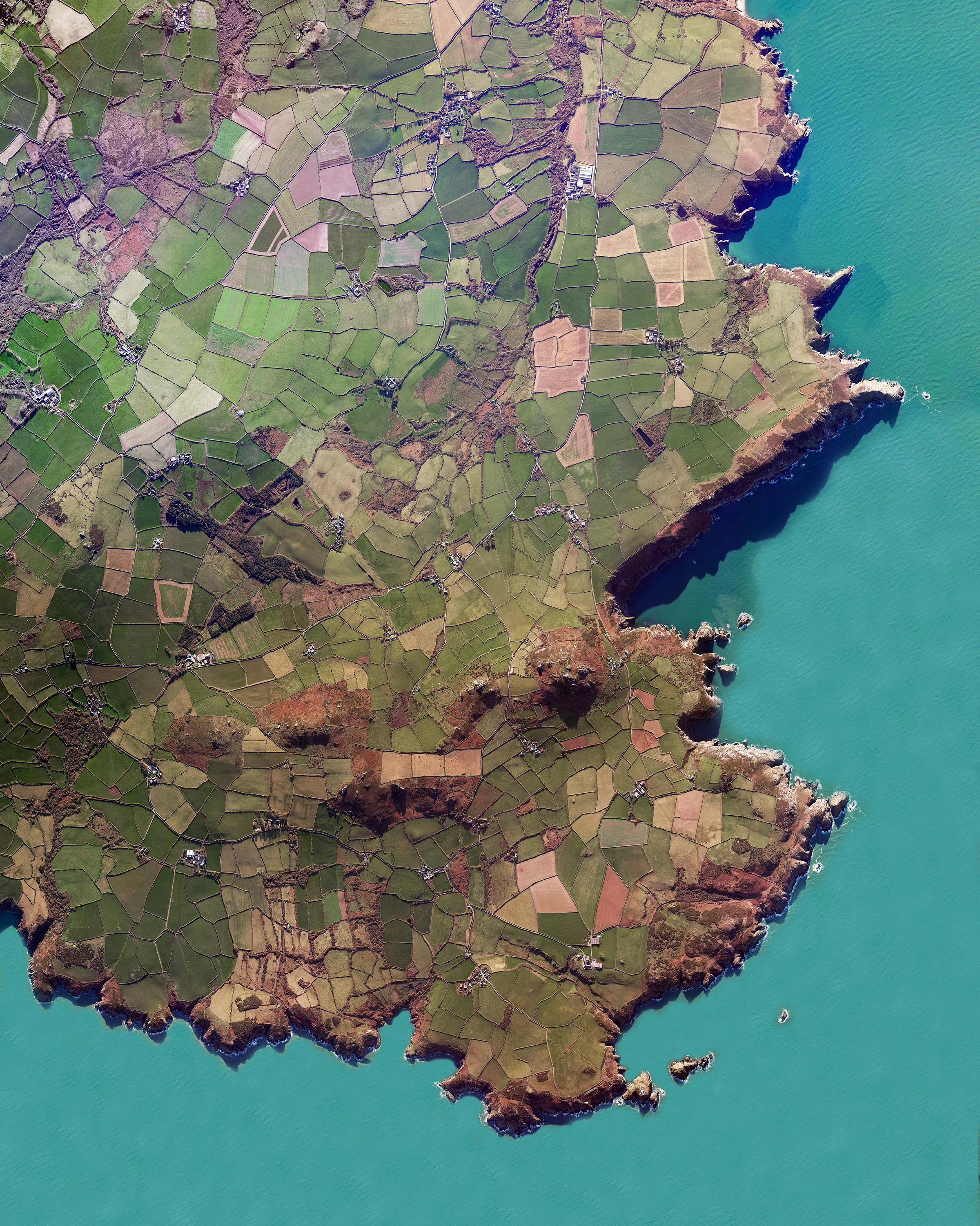 Pembrokeshire is a county in the southwest of Wales. The area is home to Pembrokeshire Coast National Park, which includes a 186-mile walking trail known as the Pembrokeshire Coast Path. This image is on display right now at our exhibition at theprintspace in Shoreditch, London. We're also selling prints of it, and – thanks to theprintspace – we are able to offer FREE shipping throughout Europe during the exhibition, which ends November 26th! Visit dailyoverview.com/printshop/country to take advantage of this exclusive offer. 52°00’52.2”N, 5°05’14.0”W Source imagery: DigitalGlobe