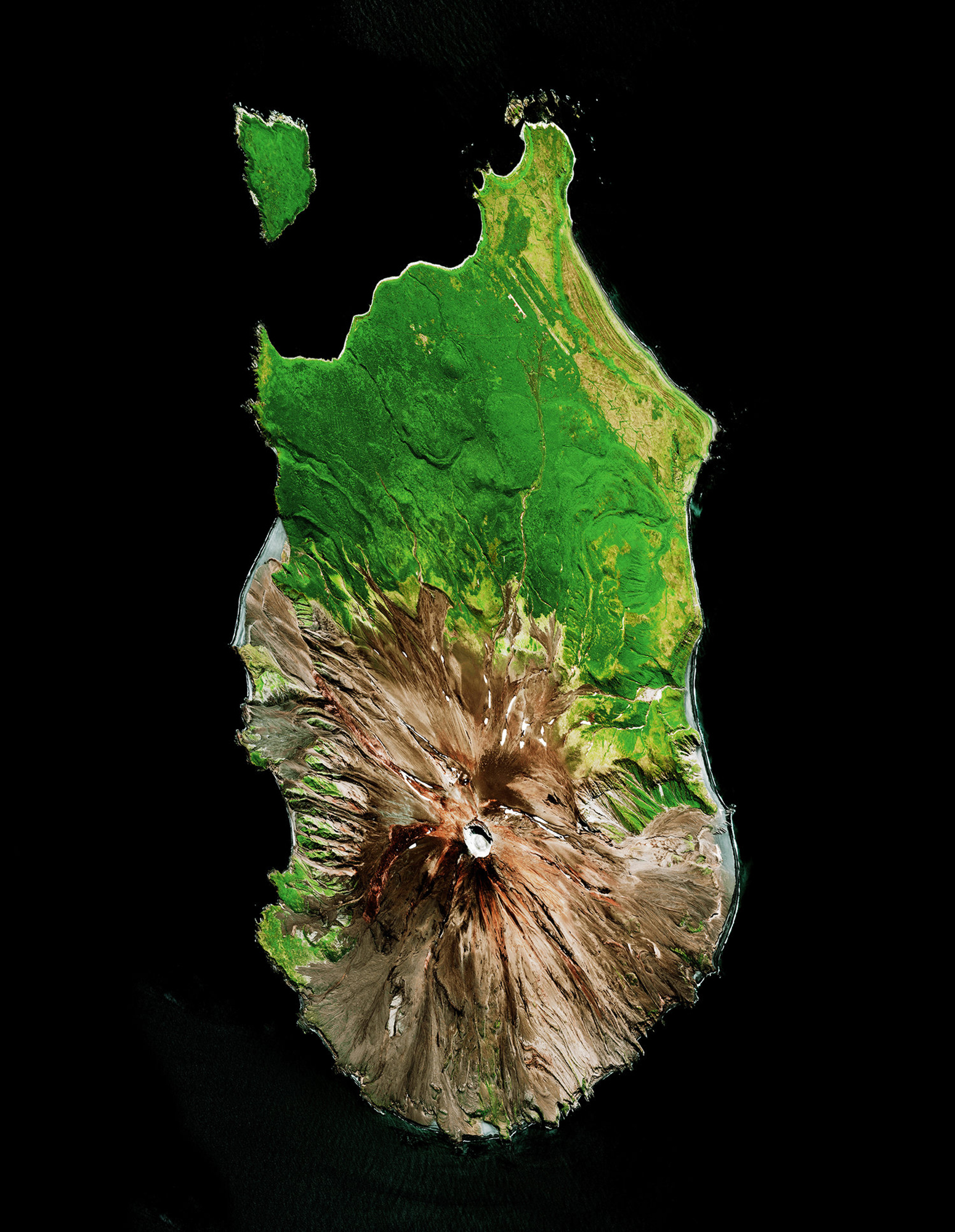 Sarychev Peak is located on Matua Island in the Kuril Islands of Russia. When the volcano erupted on June 11, 2009, the expulsion of debris caused significant interruption to air traffic between east Asia and North America. The eruption was also so great that astronauts aboard the International Space Station were able to photograph the plumes of ash and smoke rising from its cone, as the force of its shock waves dispersed all clouds covering the area. 48°05'26.9"N 153°11'59.0"E Source imagery: DigitalGlobe