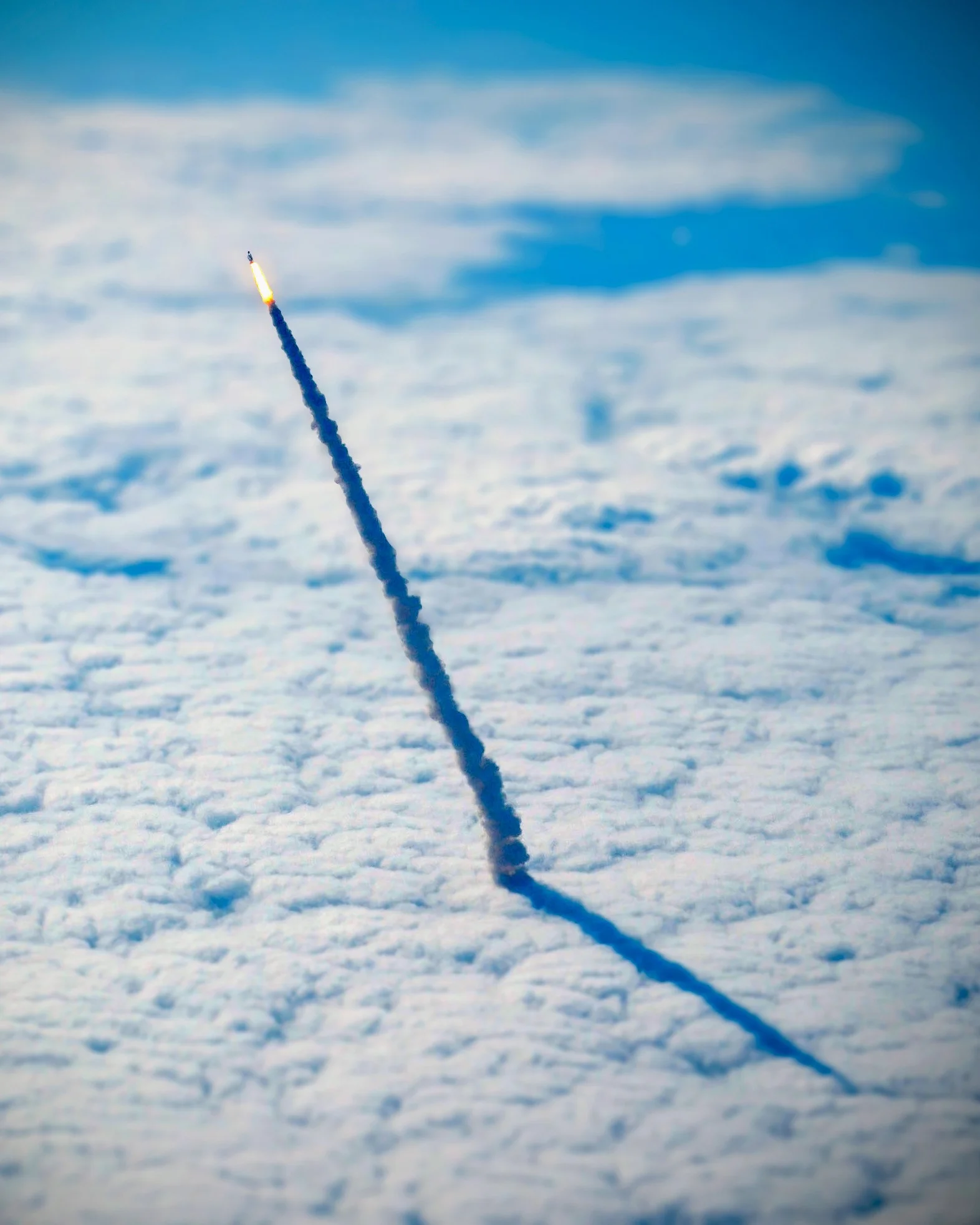 For your daily dose of perspective, here’s a photograph of the space shuttle Endeavour, lifting through the clouds during its final launch in May 2011. The photograph was captured from a nearby NASA shuttle training aircraft. Source imagery: NASA - National Aeronautics and Space Administration