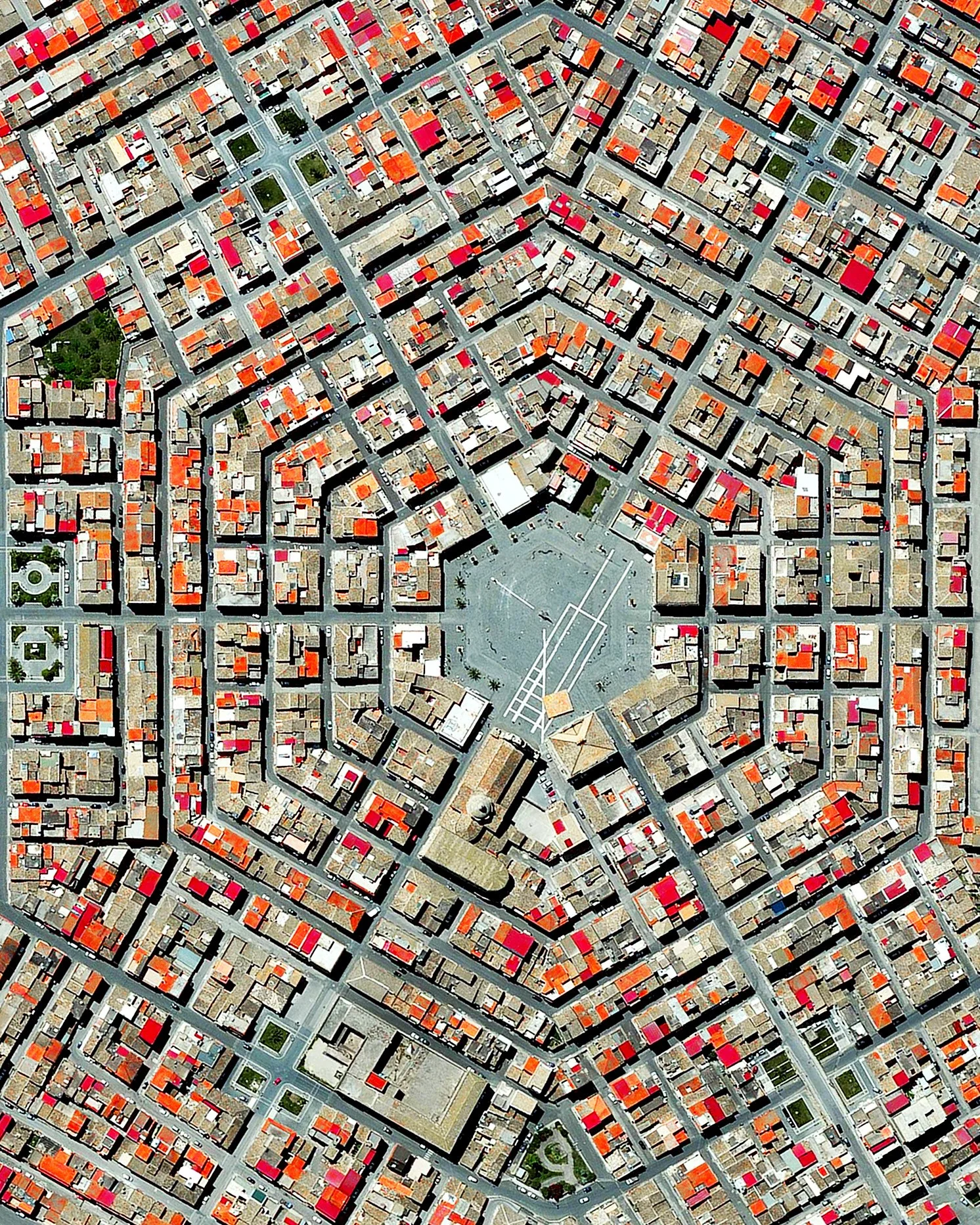 Grammichele is located on the island of Sicily in southern Italy. The town was constructed in 1693 with a distinctive hexagonal street plan after an earthquake destroyed the nearby, old town of Occhialà. 37°12'53.0"N 14°38'11.0"E Source imagery: DigitalGlobe