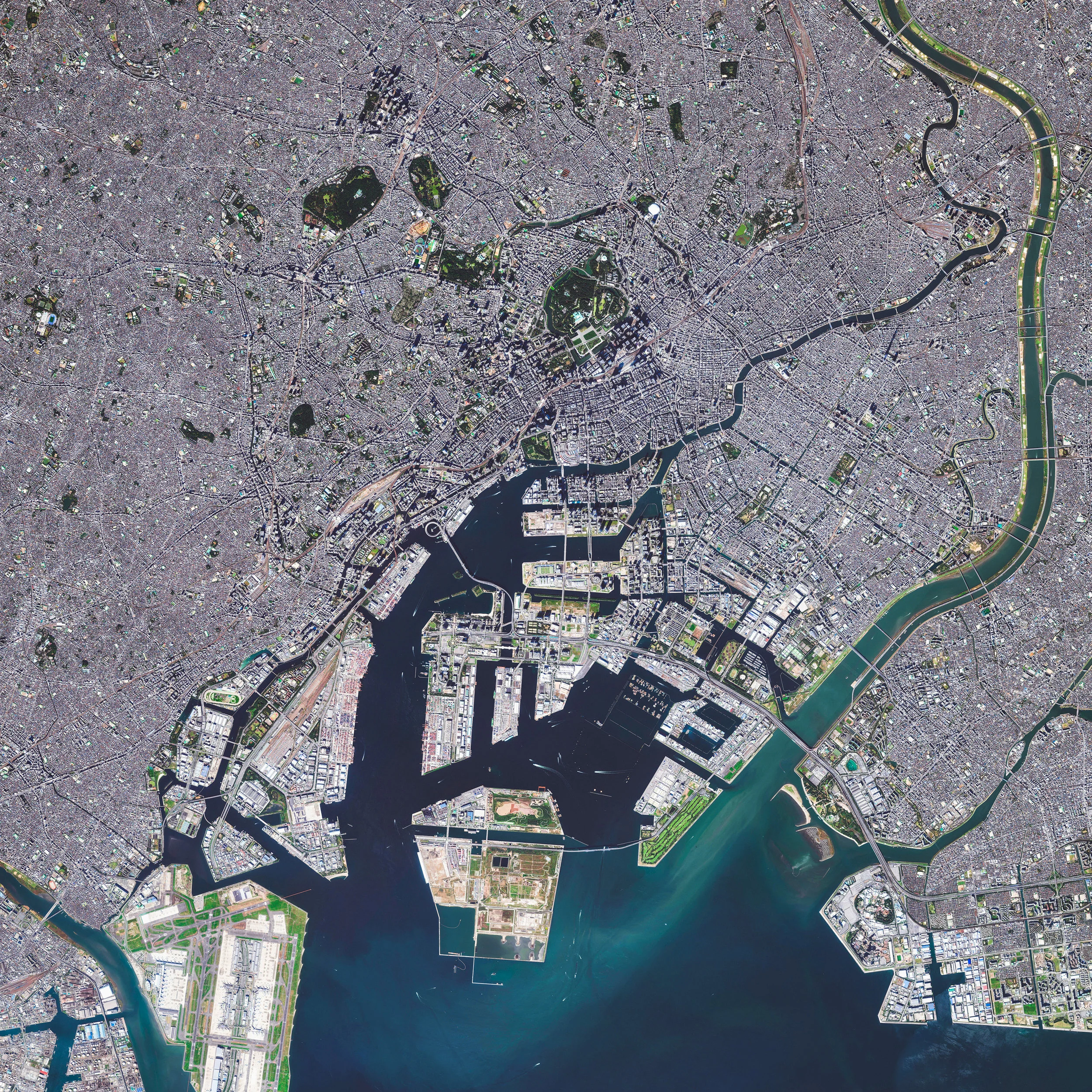 Tokyo is the capital of Japan and the most populous metropolitan area in the world, with upwards of 38 million residents. Also, as of 2014, it had the largest metropolitan economy in the world, boasting a total gross domestic product (GDP) of $1.6 trillion. This Overview captures just a small portion of the city on Tokyo Bay, with the Arakawa River featured on the right-hand side. 35°40'00.0"N, 139°49'00.0"E Source imagery: DigitalGlobe