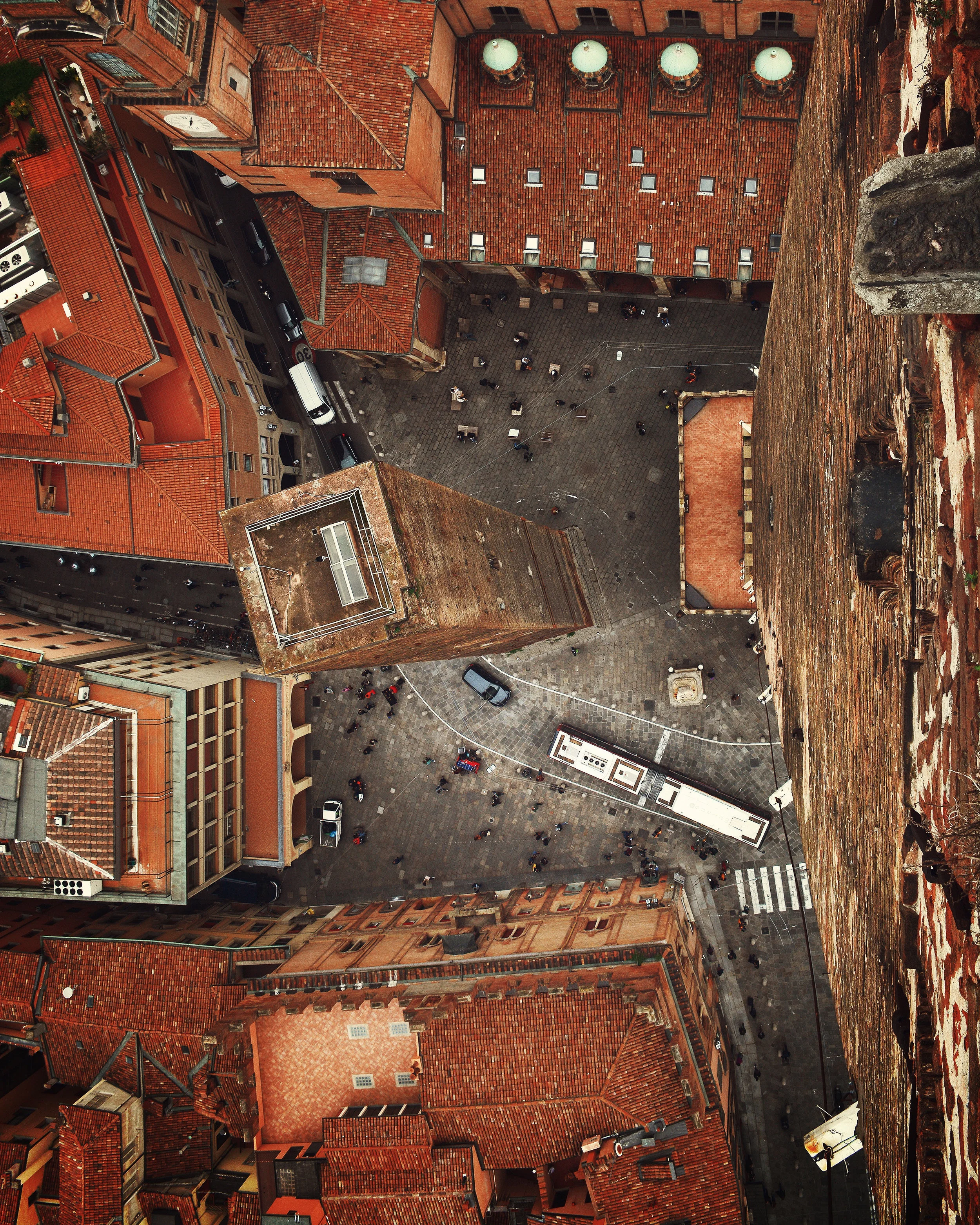 Check out this aerial view of Bologna, Italy, taken atop Asinelli Tower. This tower was constructed between 1109 and 1119 and is the most prominent of the medieval “Towers of Bologna,” at 319 feet (97.2 m) tall. Its companion tower, the Garisenda, can be seen at the center of the courtyard and is roughly 157 feet (48 m) tall. 44°29'39.5"N, 11°20'48.5"E Source imagery: @bogdandada